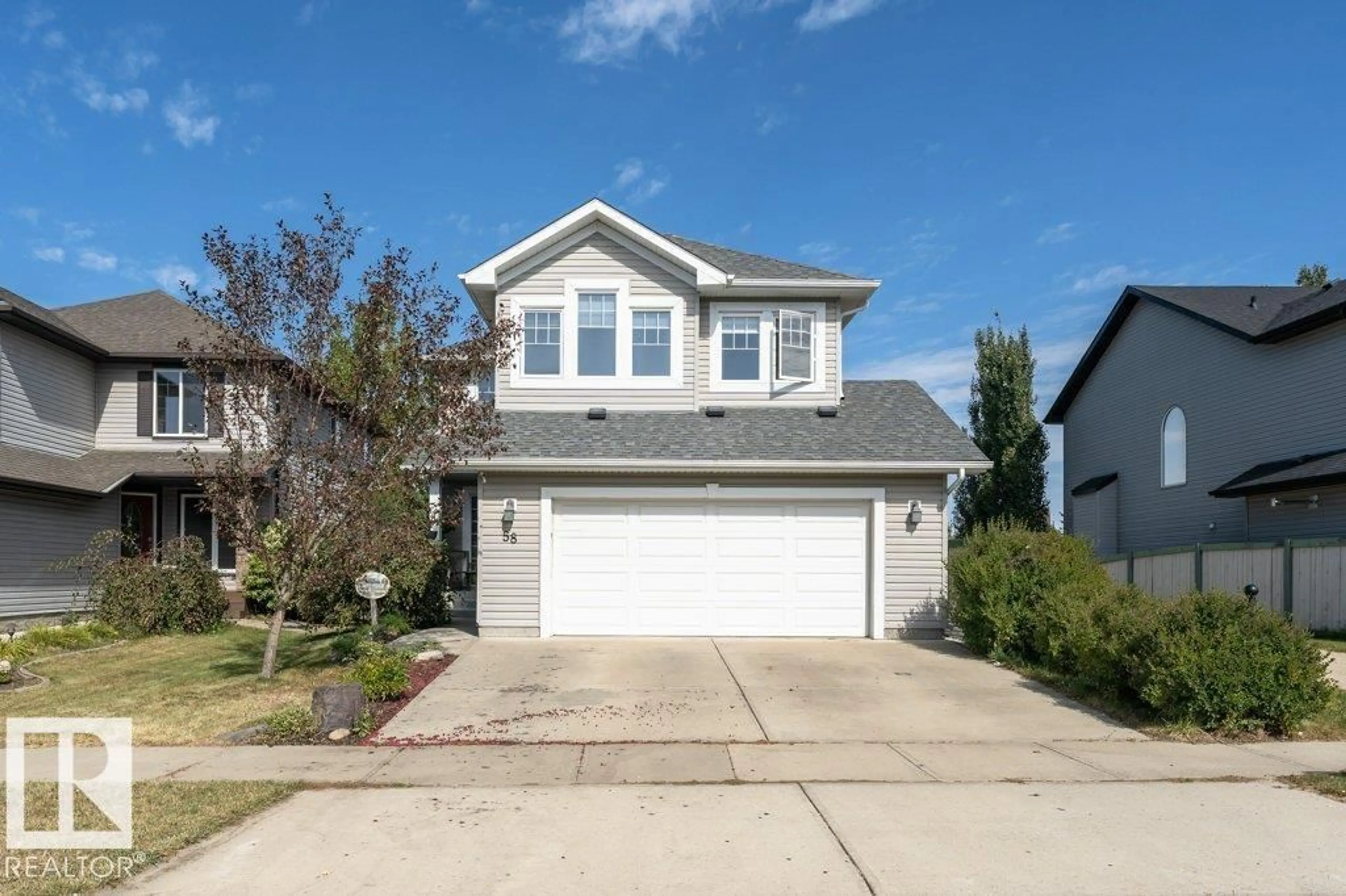 Home with vinyl exterior material, street for 58 CRANBERRY BN, Fort Saskatchewan Alberta T8L0H2