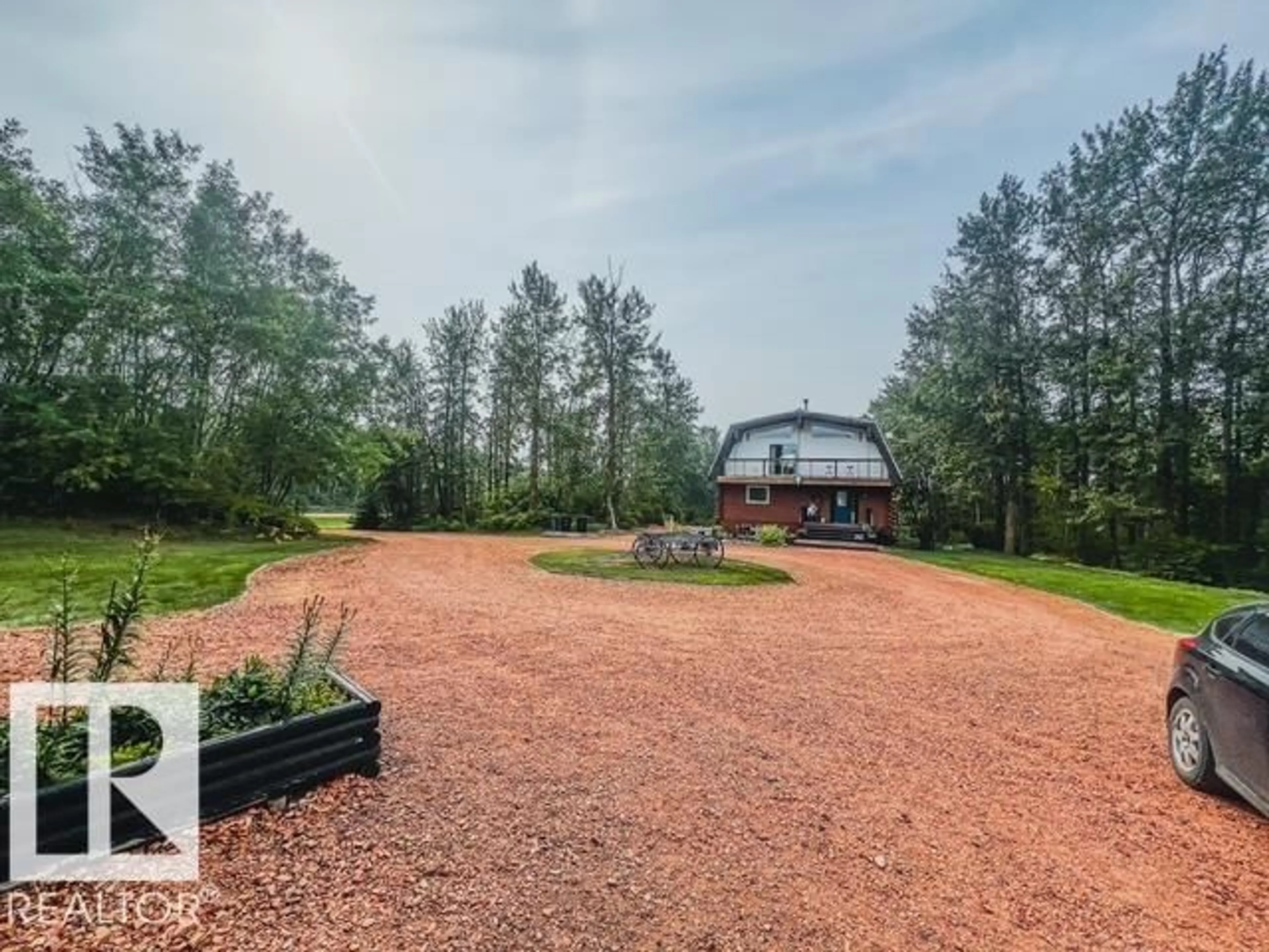 A pic from outside/outdoor area/front of a property/back of a property/a pic from drone, unknown for 21252 - 25 TWP ROAD 530, Rural Strathcona County Alberta T8G2C4