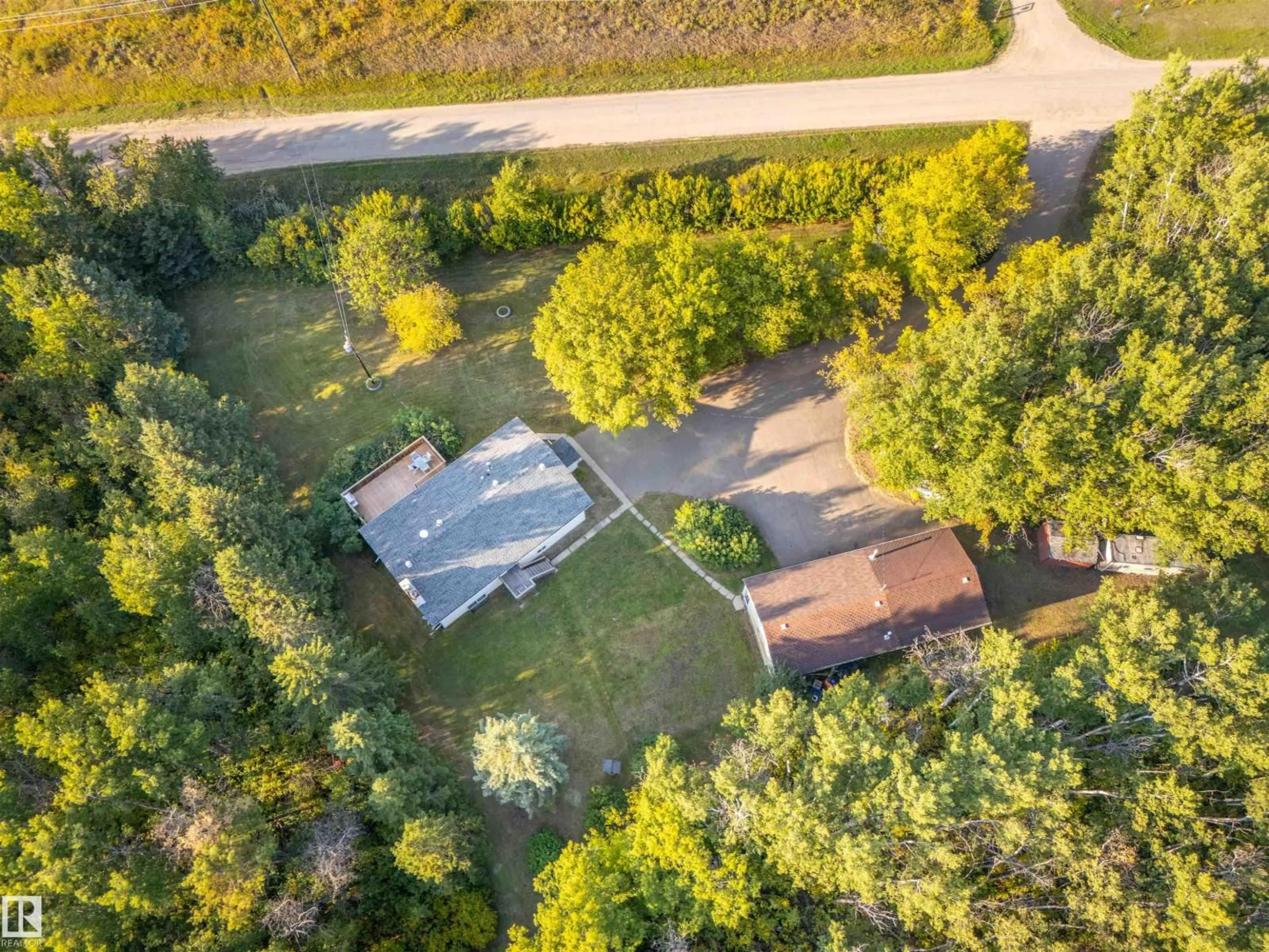 A pic from outside/outdoor area/front of a property/back of a property/a pic from drone, forest/trees view for 42217 TWP RD 624, Rural Bonnyville M.D. Alberta T9M1P2