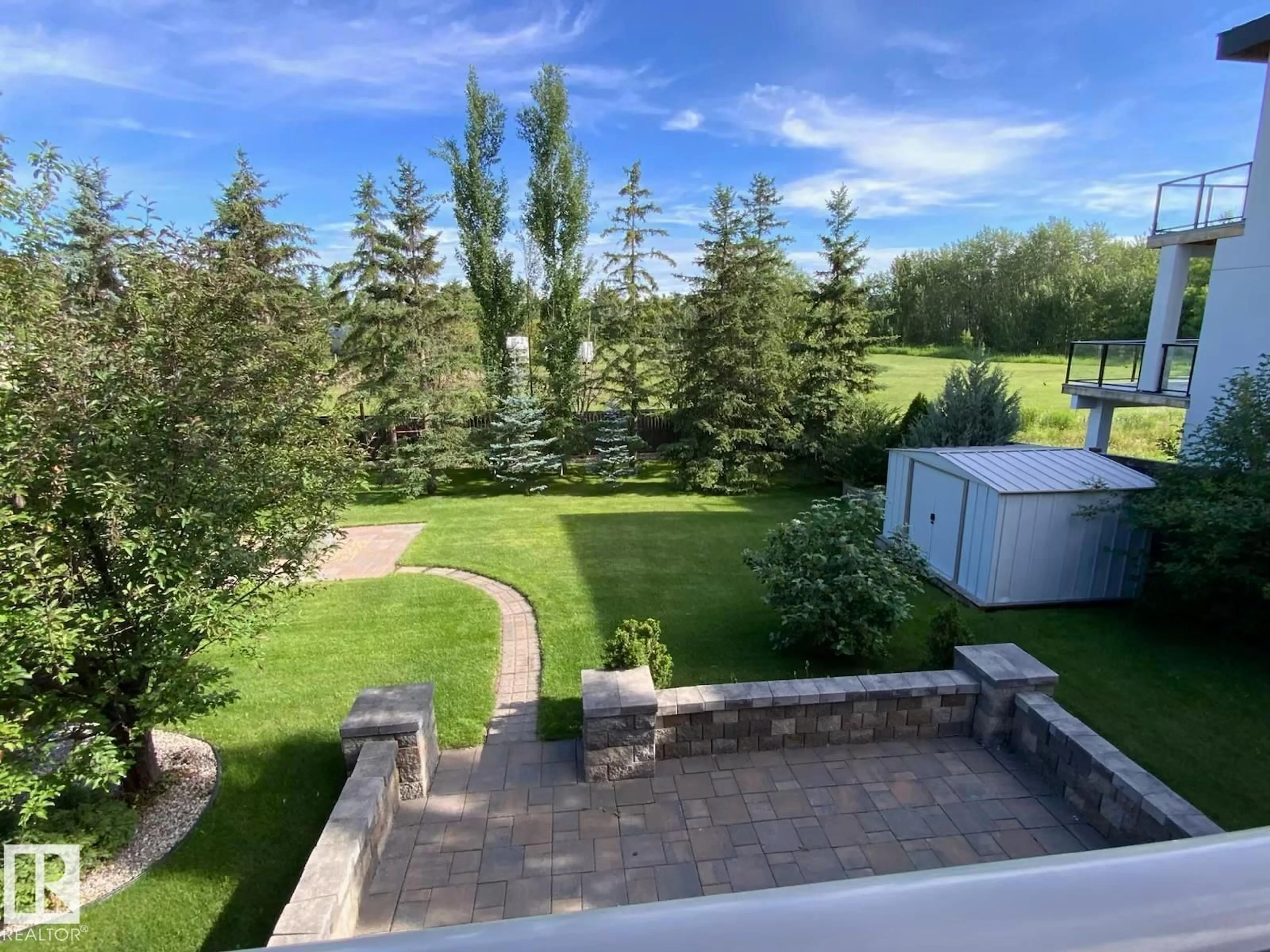 A pic from outside/outdoor area/front of a property/back of a property/a pic from drone, water/lake/river/ocean view for 52327 RGE ROAD 233, Rural Strathcona County Alberta T8B1C6