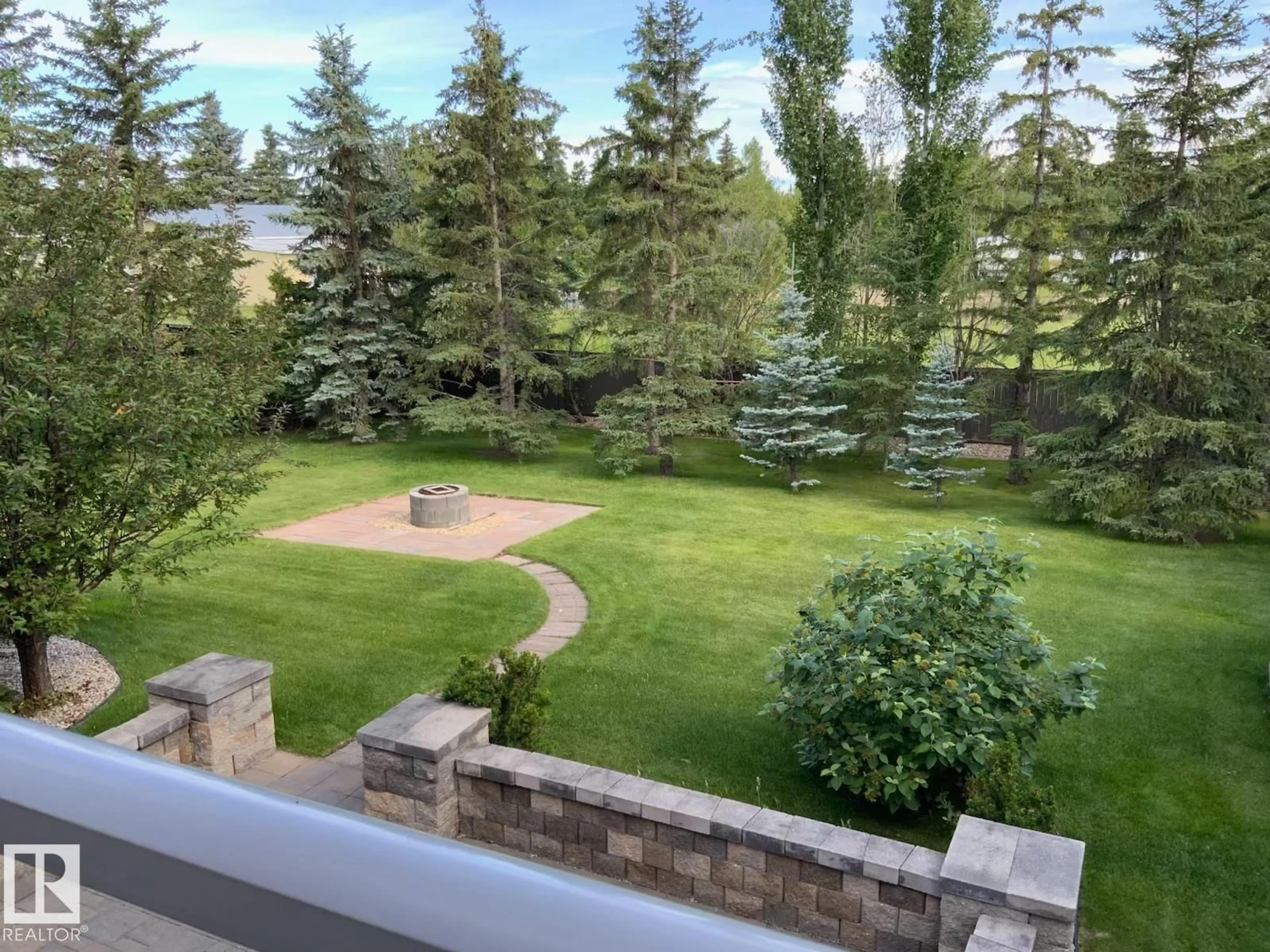 A pic from outside/outdoor area/front of a property/back of a property/a pic from drone, forest/trees view for 52327 RGE ROAD 233, Rural Strathcona County Alberta T8B1C6