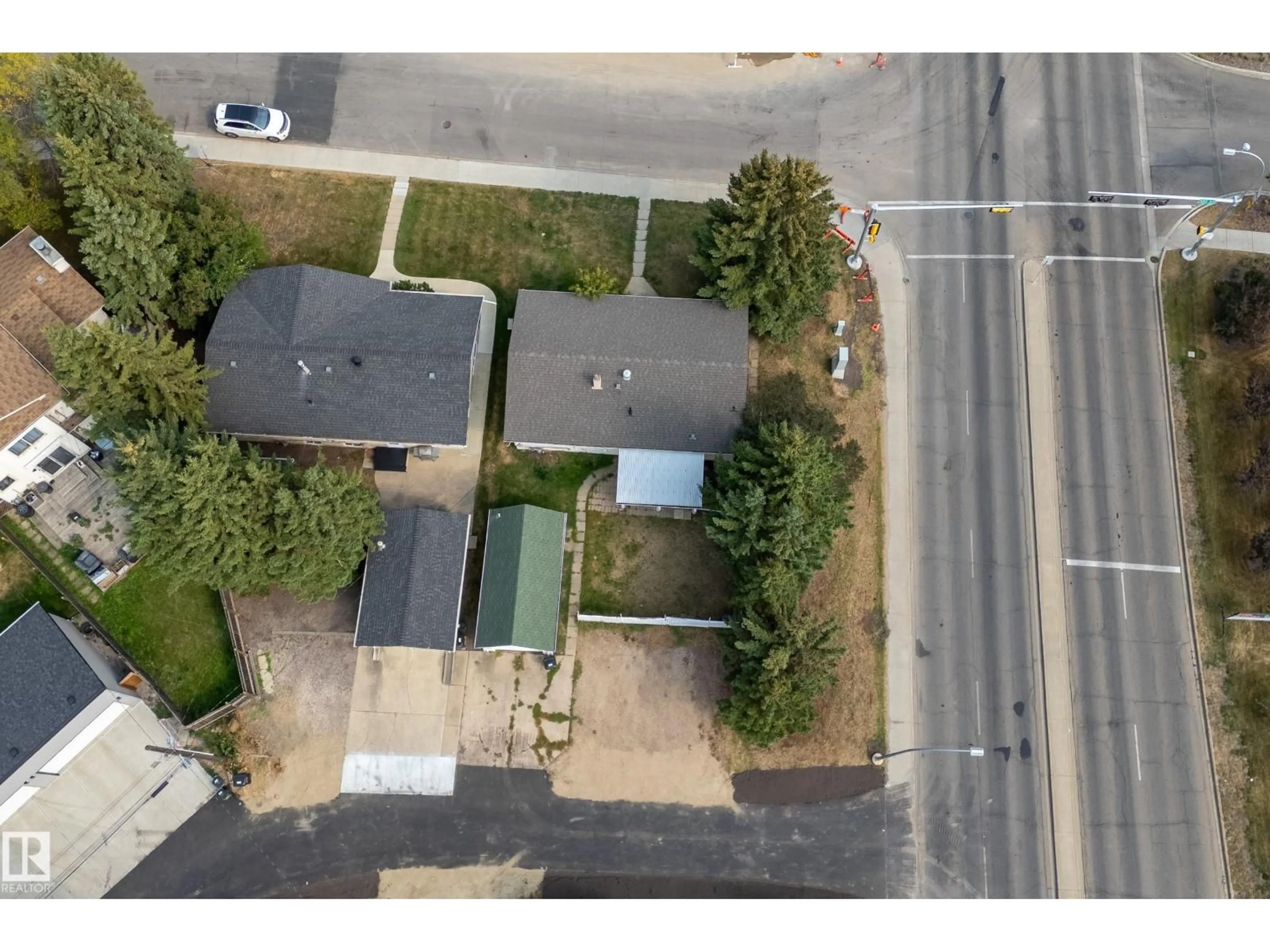 A pic from outside/outdoor area/front of a property/back of a property/a pic from drone, street for 6204 105 ST, Edmonton Alberta T6H2N5