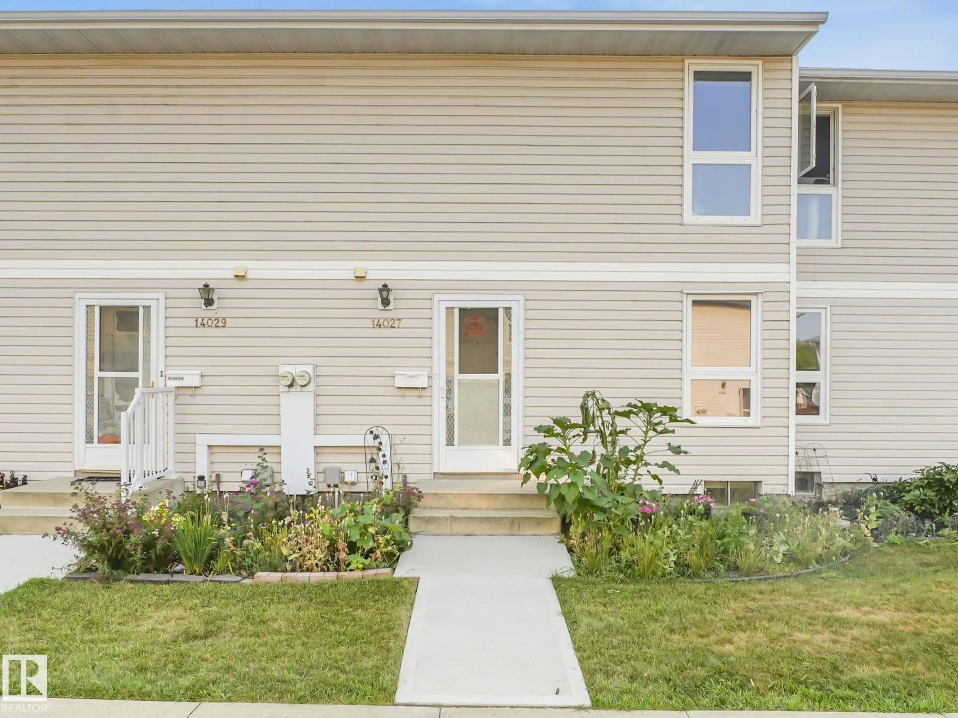 Home with vinyl exterior material, street for NW - 14027 121 ST, Edmonton Alberta T5X4H8