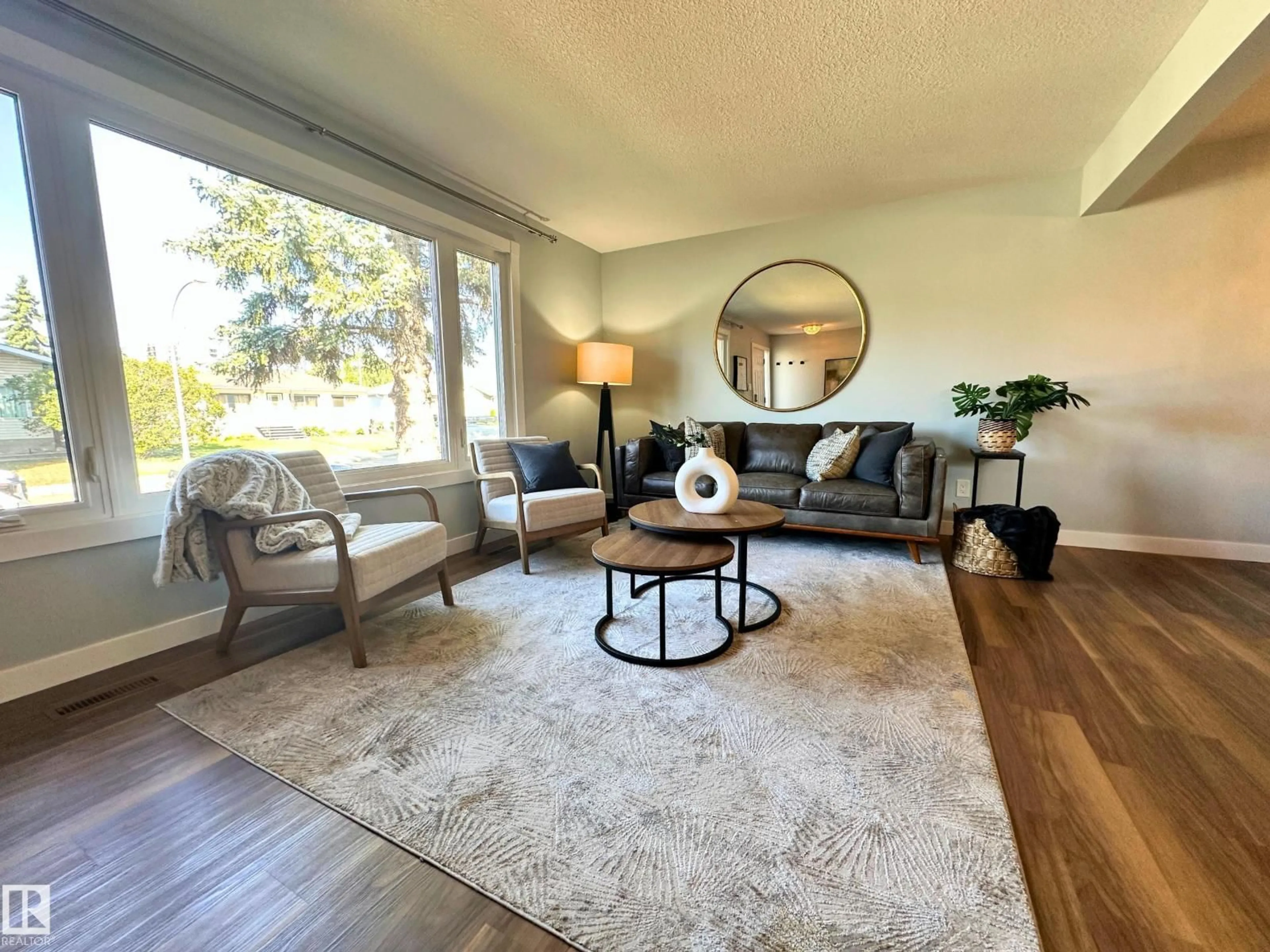 Living room with furniture, unknown for 8517 86 AV, Edmonton Alberta T6C1J4