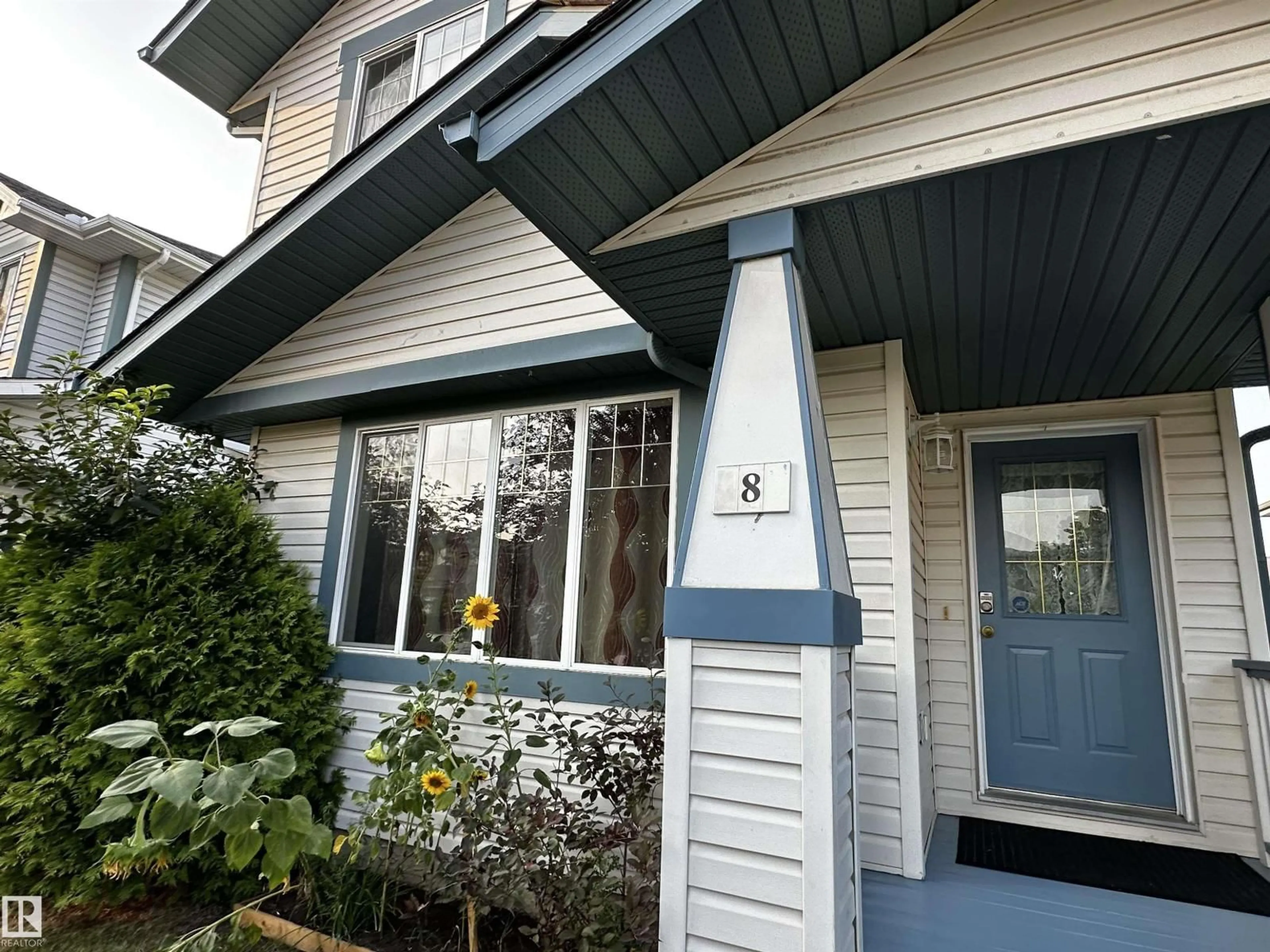 Home with vinyl exterior material, street for 8 HEATHERLANDS WY, Spruce Grove Alberta T7X4L3