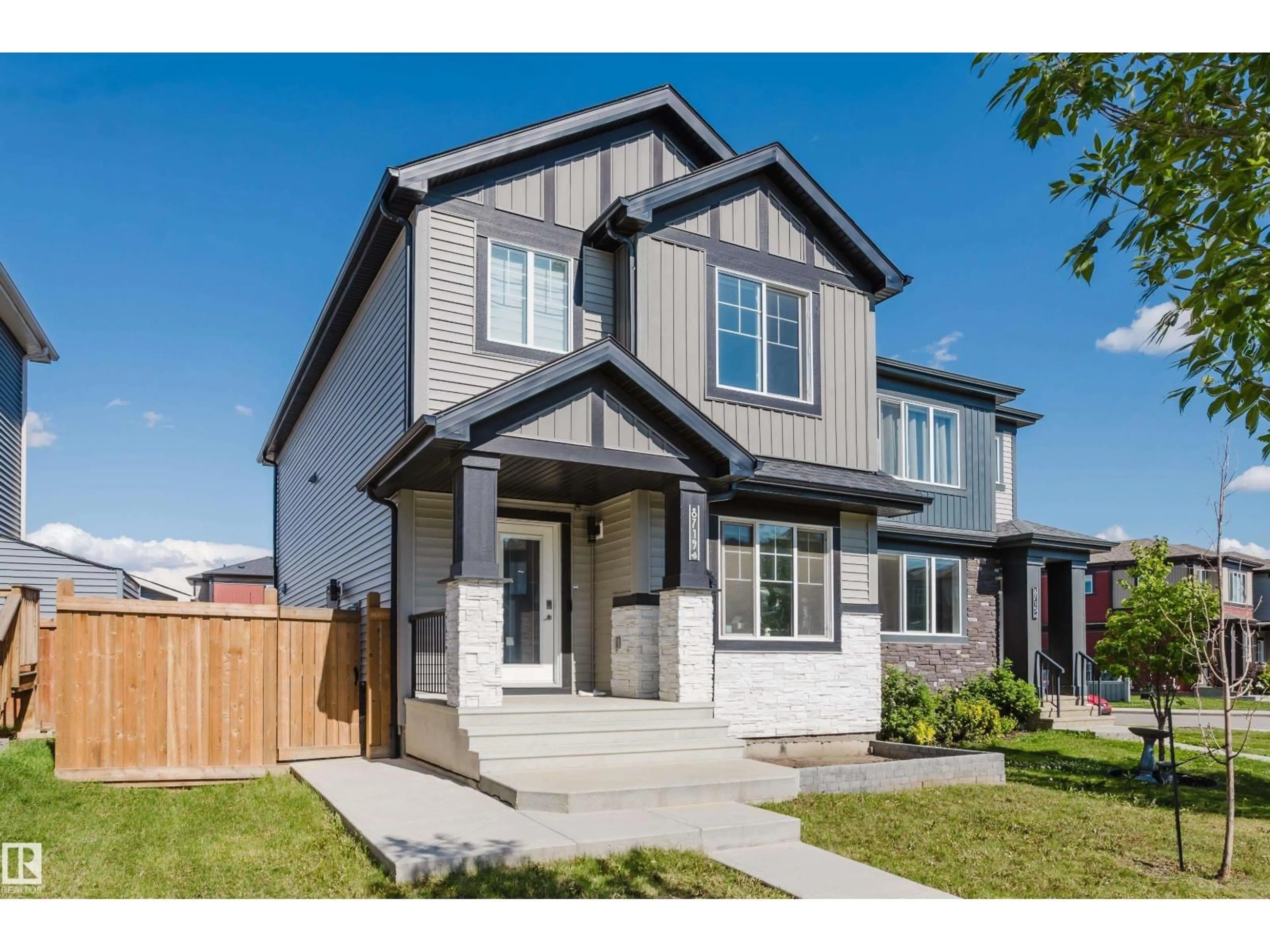 Home with vinyl exterior material, street for NW - 8719 223 ST, Edmonton Alberta T5T7L6