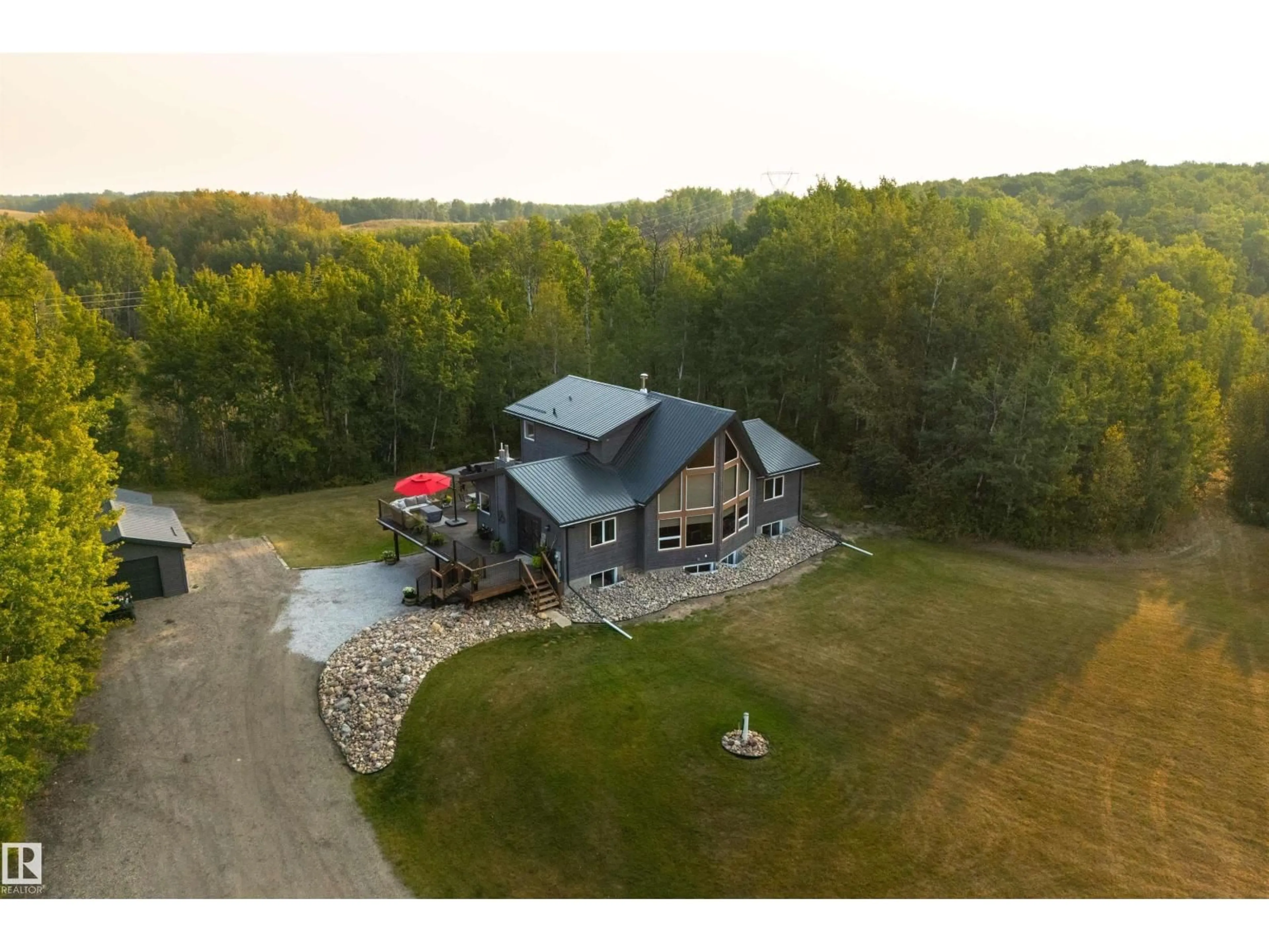 A pic from outside/outdoor area/front of a property/back of a property/a pic from drone, building for 53215 RGE ROAD 13, Rural Parkland County Alberta T7Y0C1