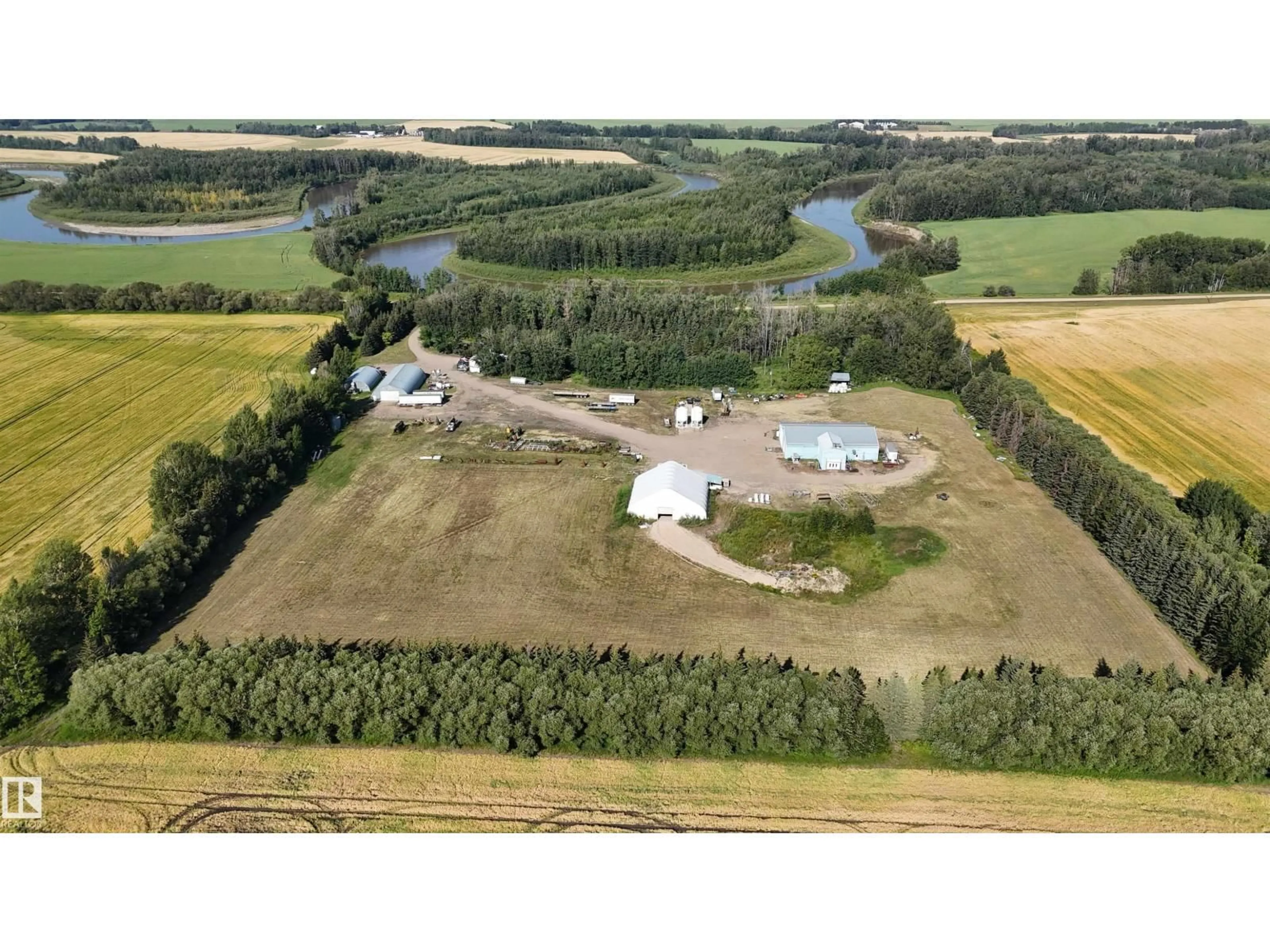 A pic from outside/outdoor area/front of a property/back of a property/a pic from drone, water/lake/river/ocean view for 61411 RGE ROAD 272, Rural Westlock County Alberta T7P2P4