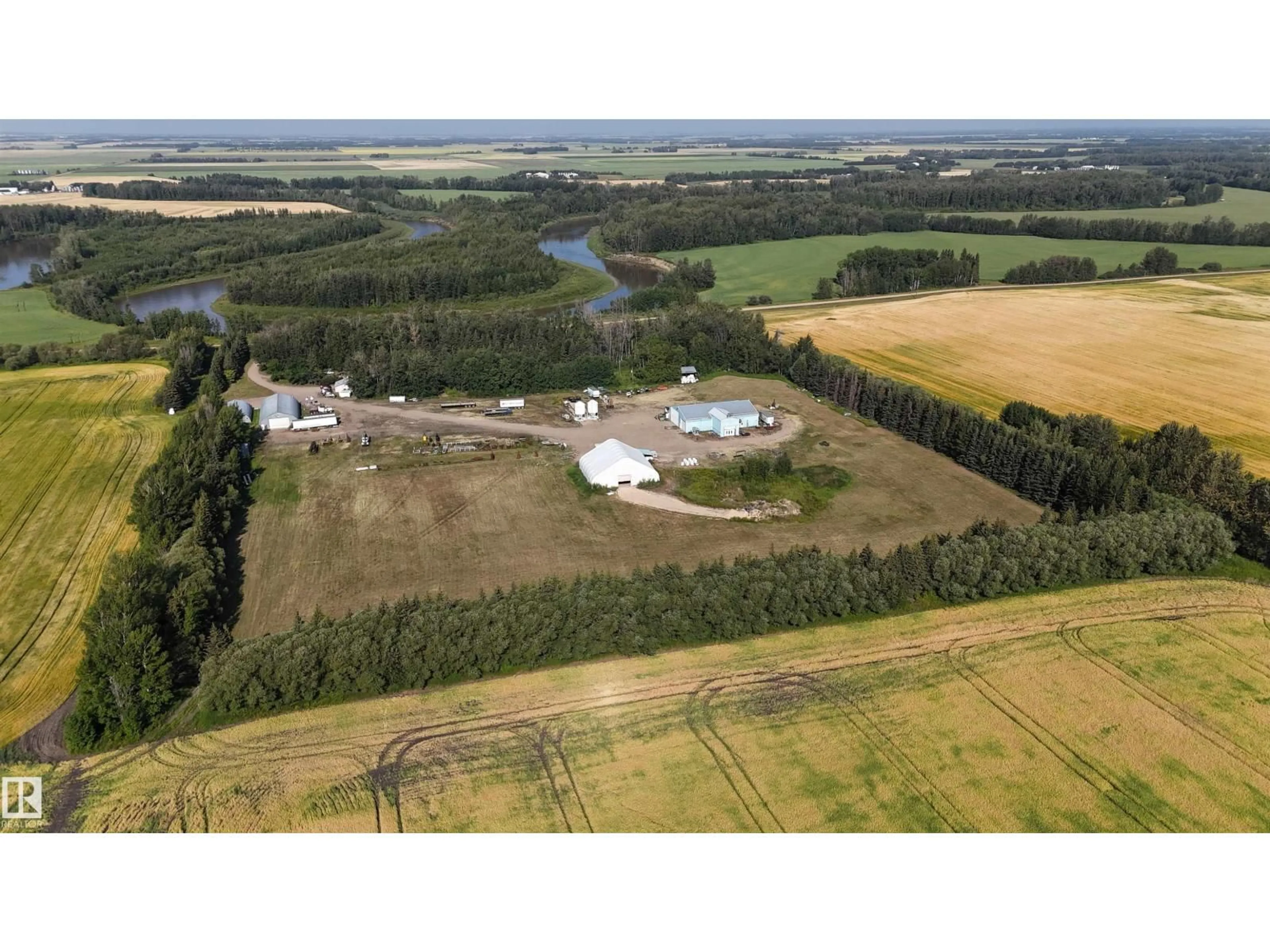 A pic from outside/outdoor area/front of a property/back of a property/a pic from drone, unknown for 61411 RGE ROAD 272, Rural Westlock County Alberta T7P2P4