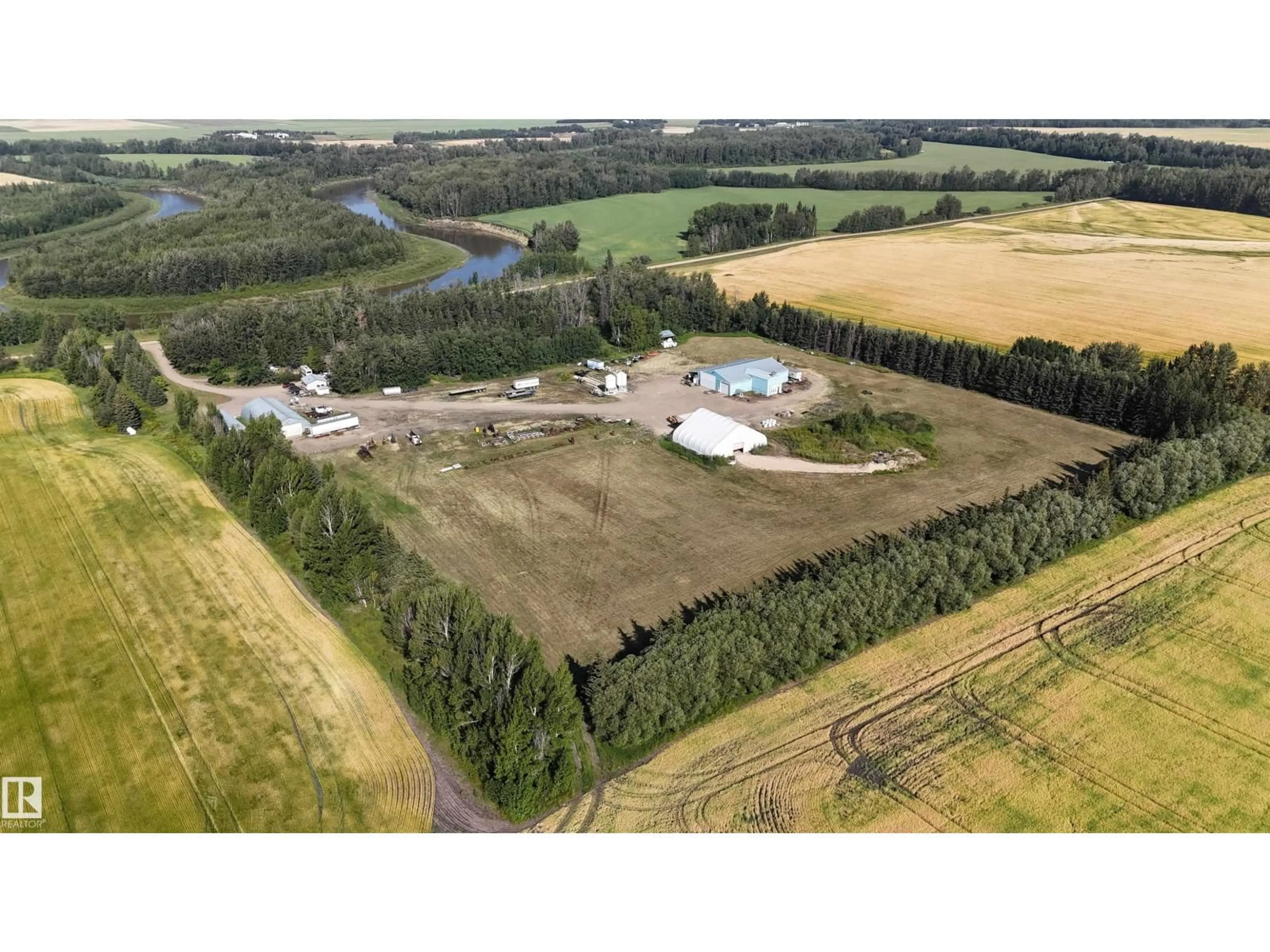 A pic from outside/outdoor area/front of a property/back of a property/a pic from drone, unknown for 61411 RGE ROAD 272, Rural Westlock County Alberta T7P2P4
