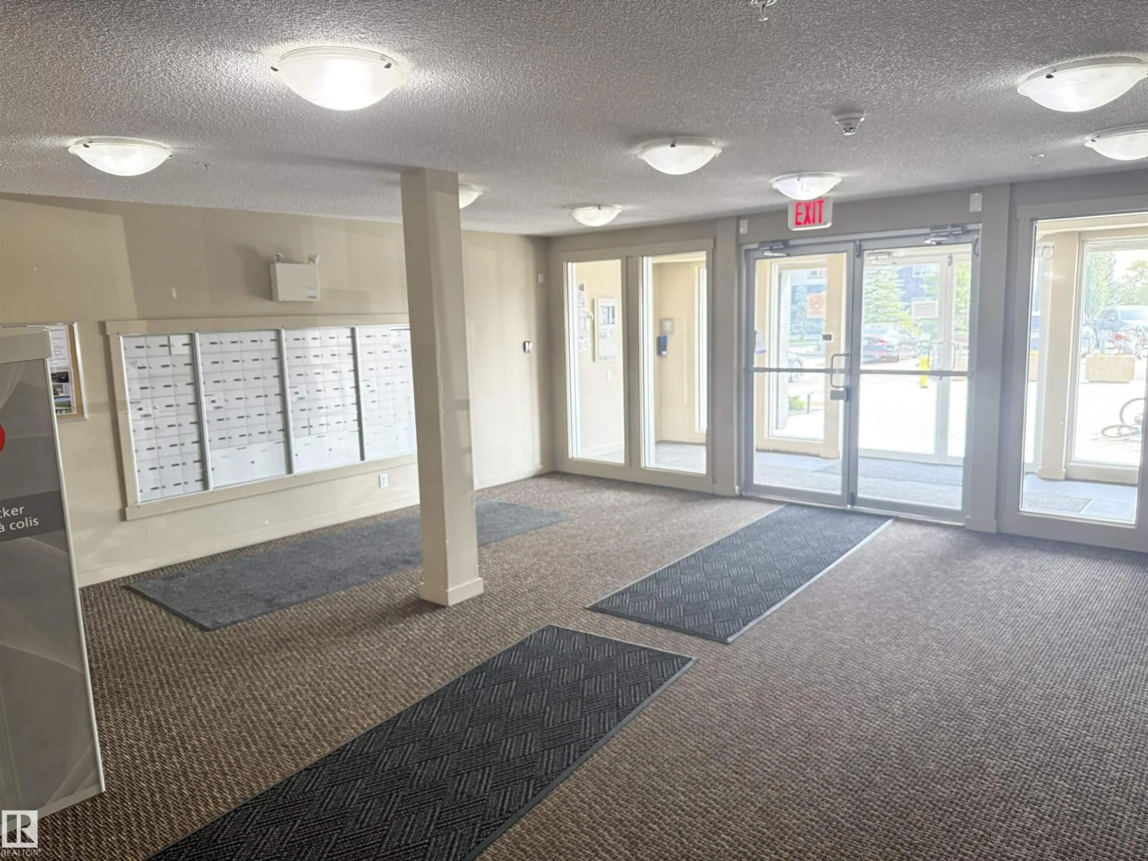 Indoor foyer for #310 - 5810 MULLEN PL, Edmonton Alberta T6R0W3