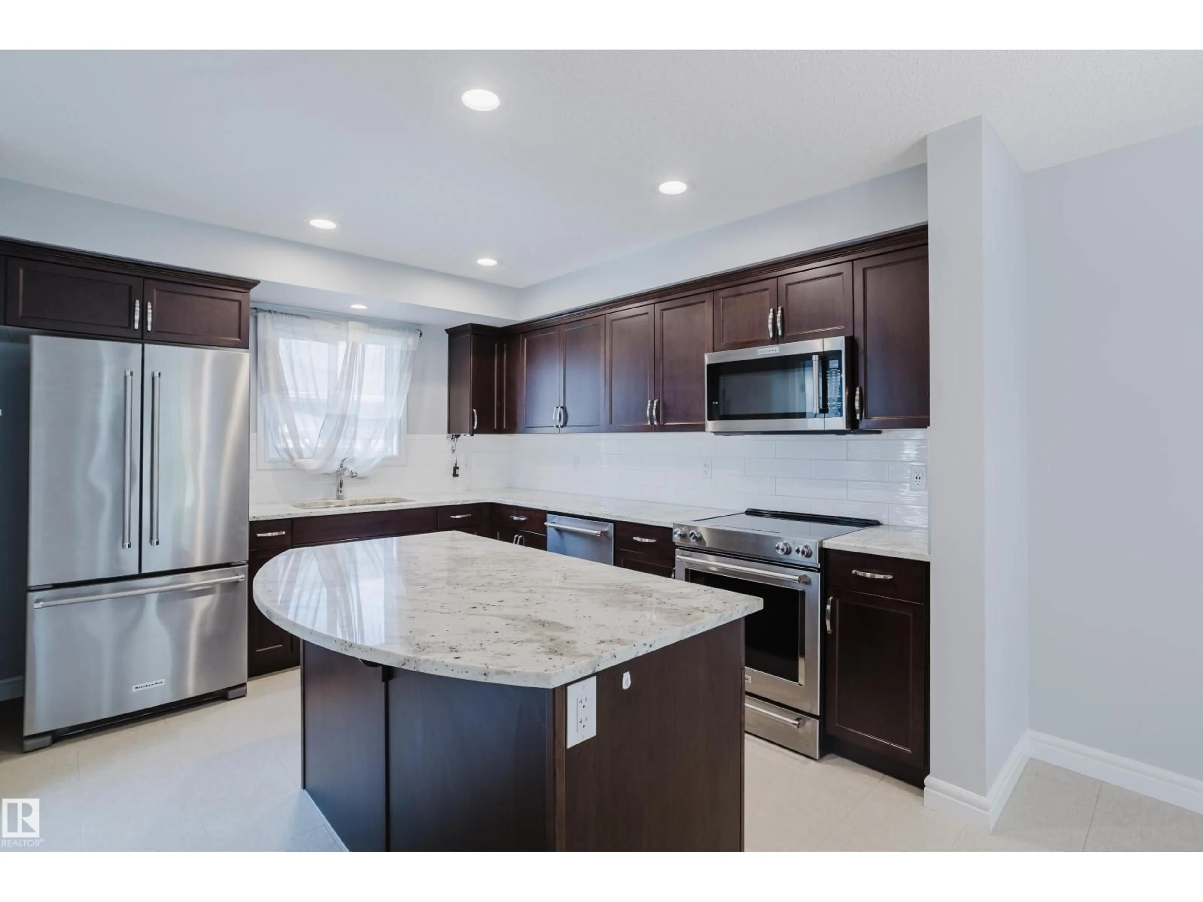Open concept kitchen, ceramic/tile floor for 184 DESROCHERS GATE, Edmonton Alberta T6W3H8