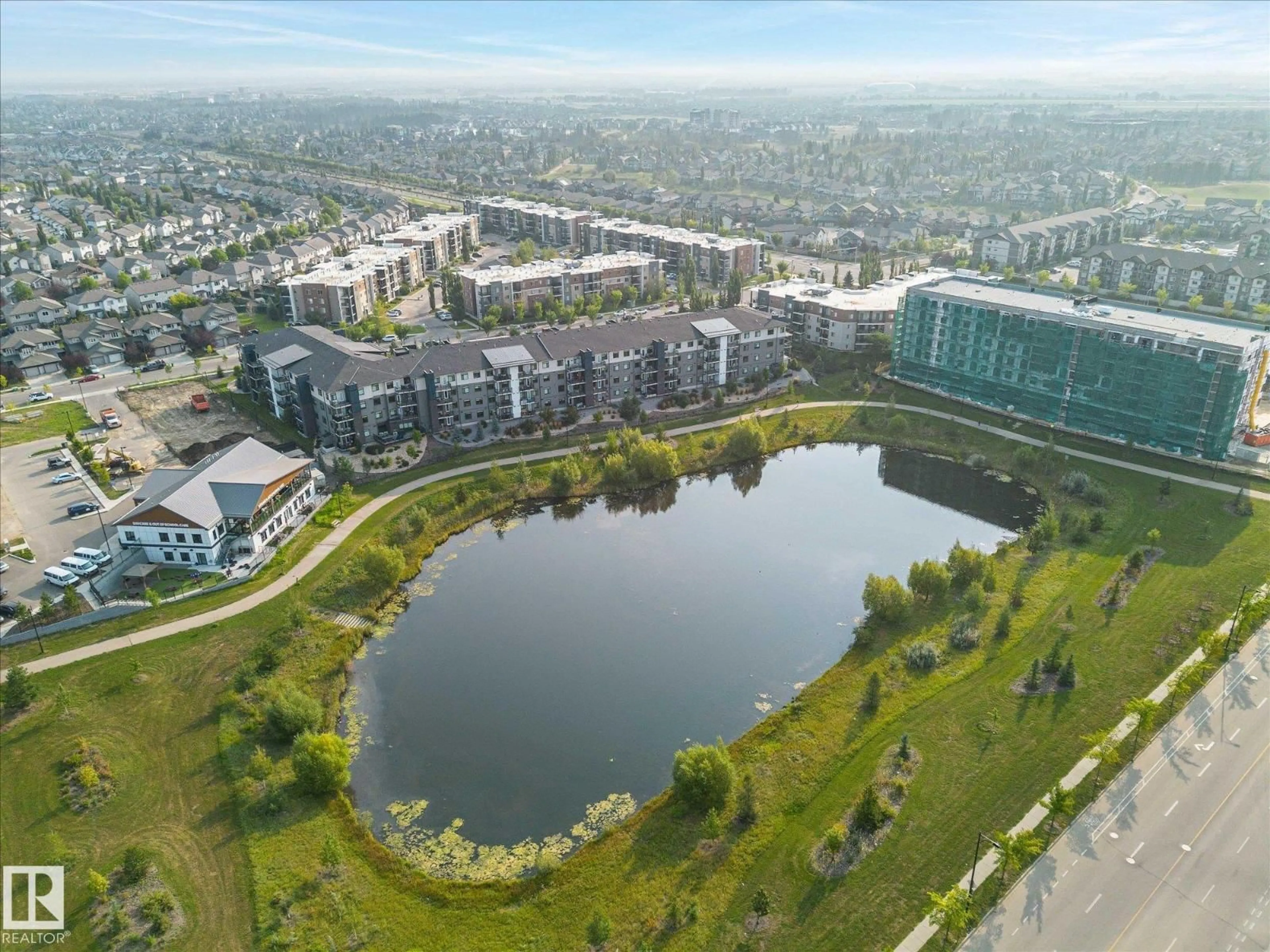 A pic from outside/outdoor area/front of a property/back of a property/a pic from drone, water/lake/river/ocean view for #402 - 11803 22 AV, Edmonton Alberta T6W2R9