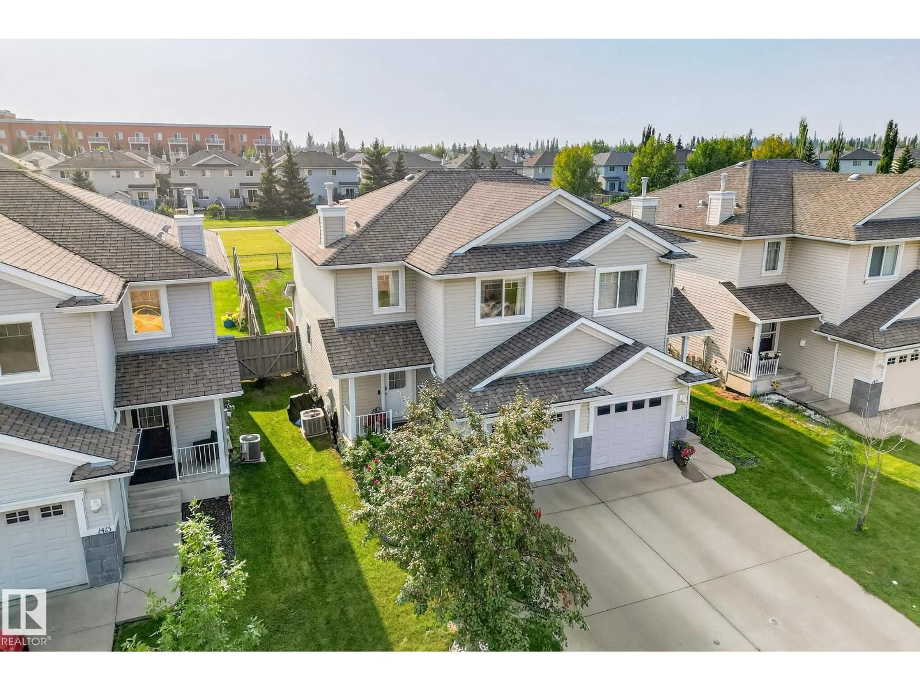 A pic from outside/outdoor area/front of a property/back of a property/a pic from drone, street for 1415 MCMILLIAN WY, Edmonton Alberta T6W1V7
