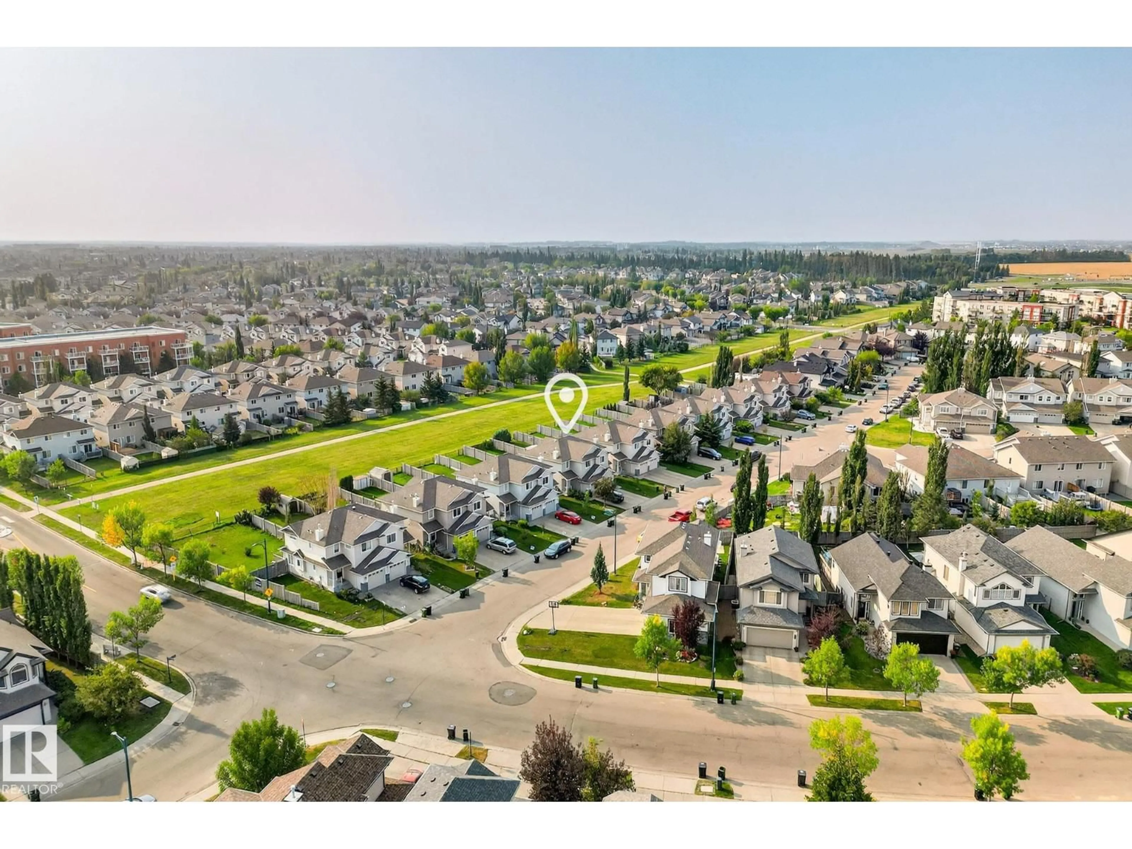 A pic from outside/outdoor area/front of a property/back of a property/a pic from drone, unknown for 1415 MCMILLIAN WY, Edmonton Alberta T6W1V7