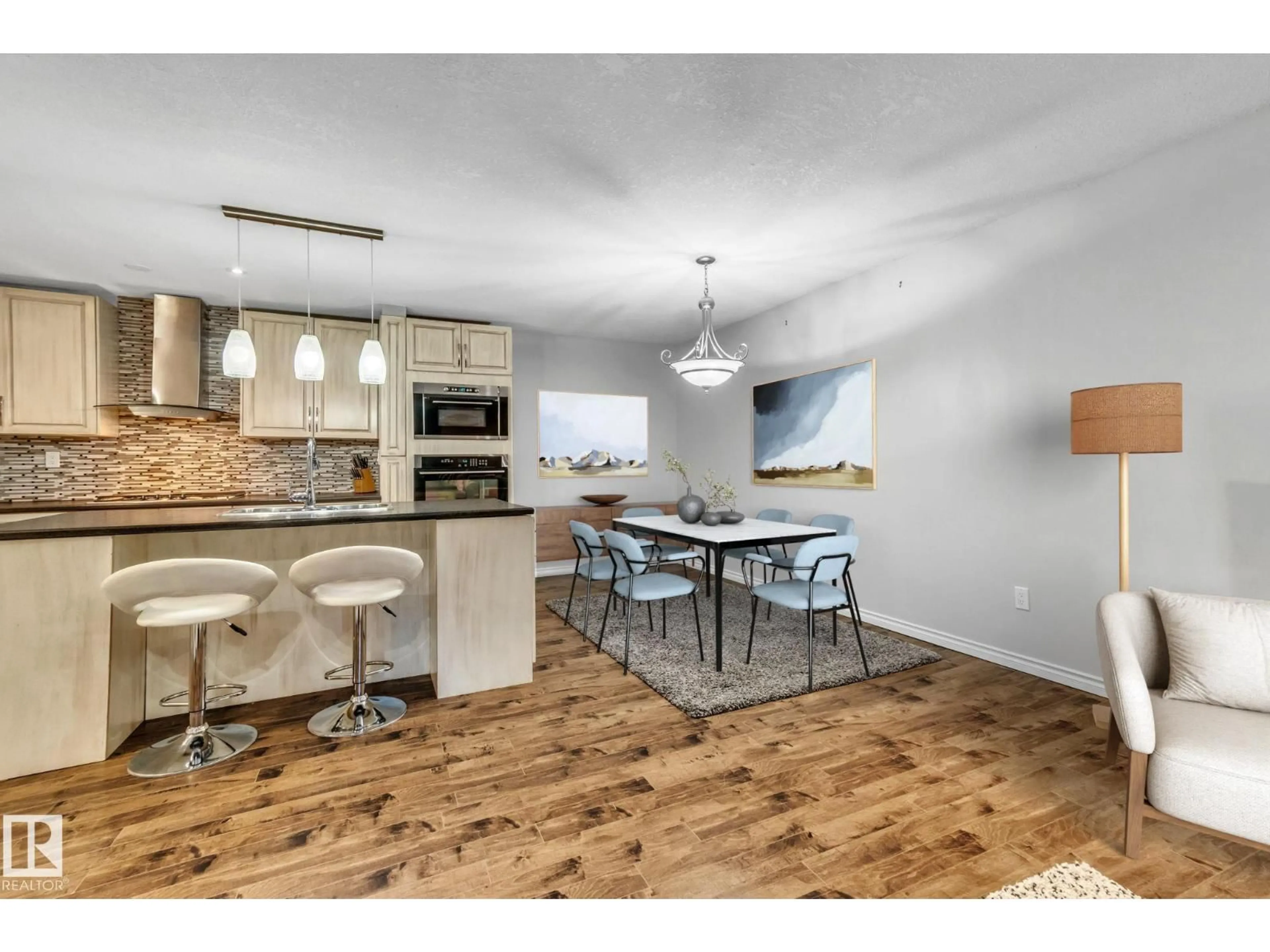 Open concept kitchen, wood/laminate floor for NW - 5758 172 ST, Edmonton Alberta T6M1B4