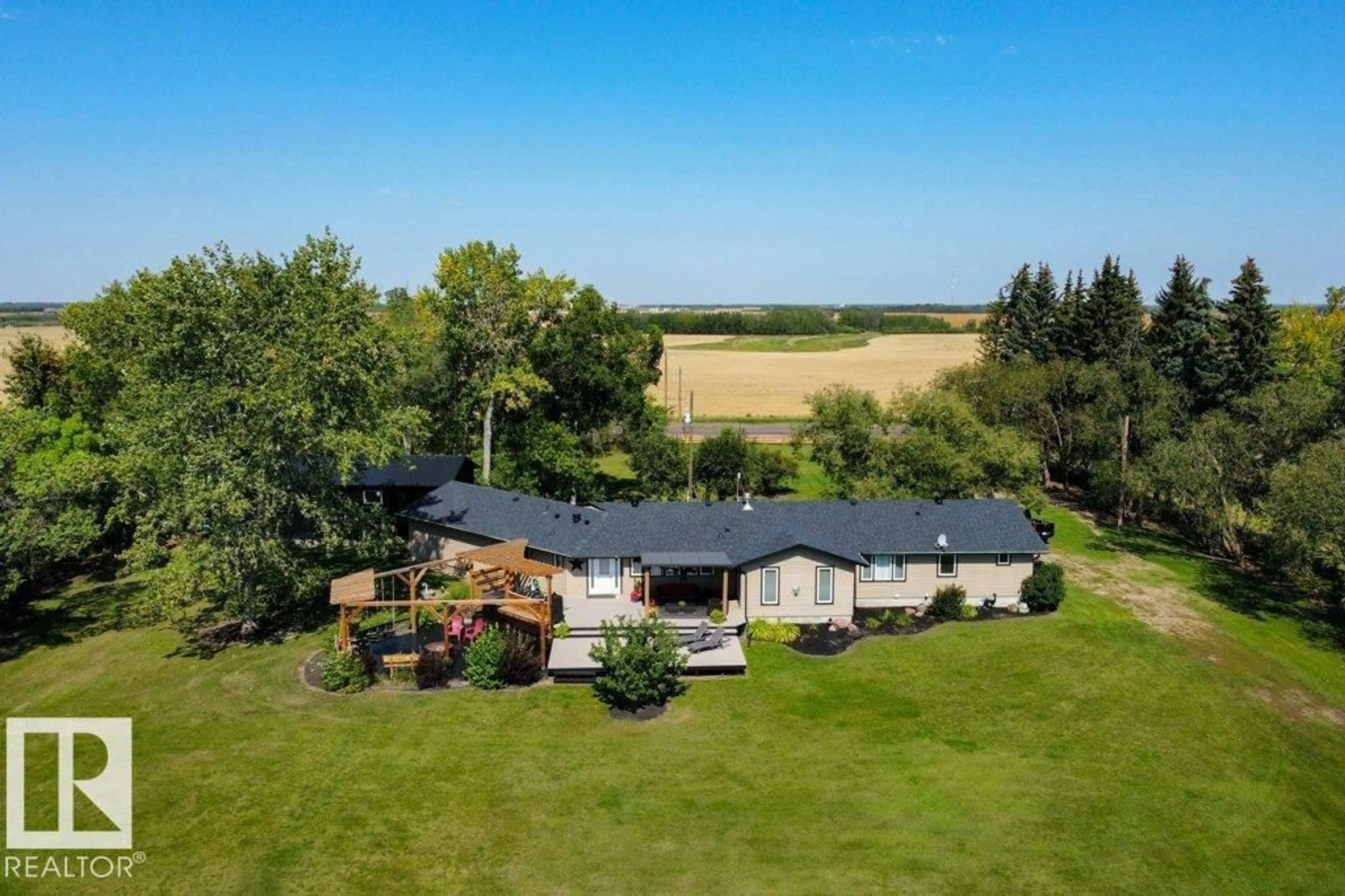 A pic from outside/outdoor area/front of a property/back of a property/a pic from drone, unknown for 25421 TWP ROAD 554, Rural Sturgeon County Alberta T8R2G7