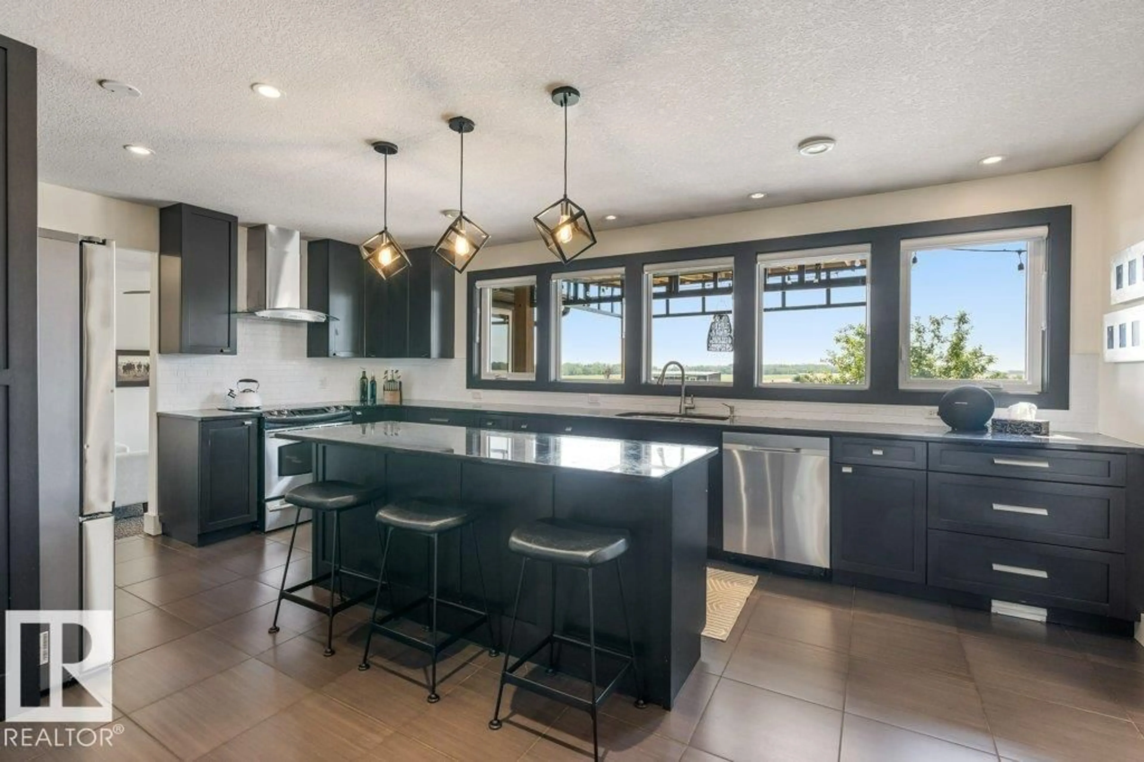 Open concept kitchen, ceramic/tile floor for 25421 TWP ROAD 554, Rural Sturgeon County Alberta T8R2G7