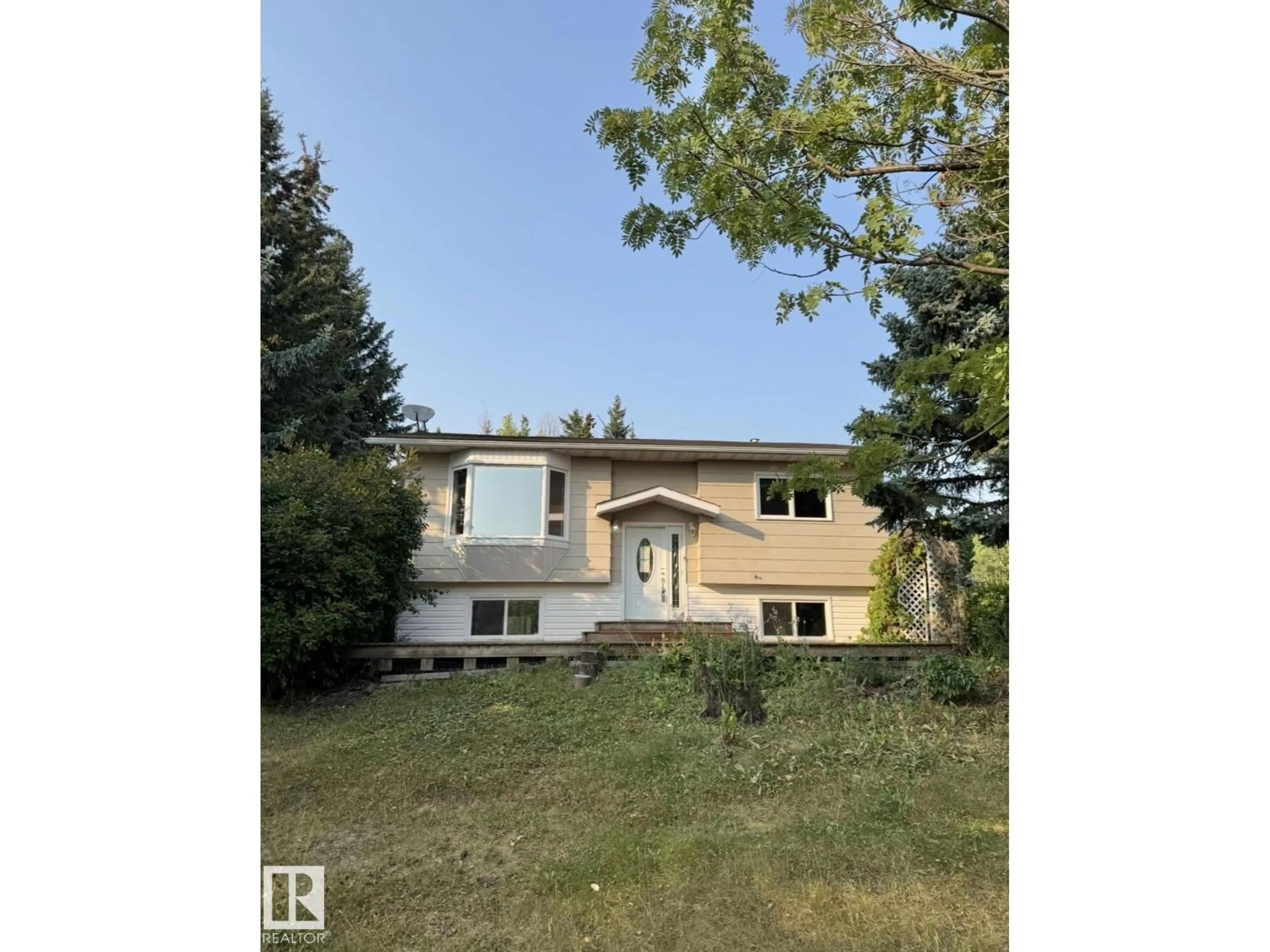 A pic from outside/outdoor area/front of a property/back of a property/a pic from drone, unknown for #22 - 53212 RANGE ROAD 15, Rural Parkland County Alberta T5Y0C3