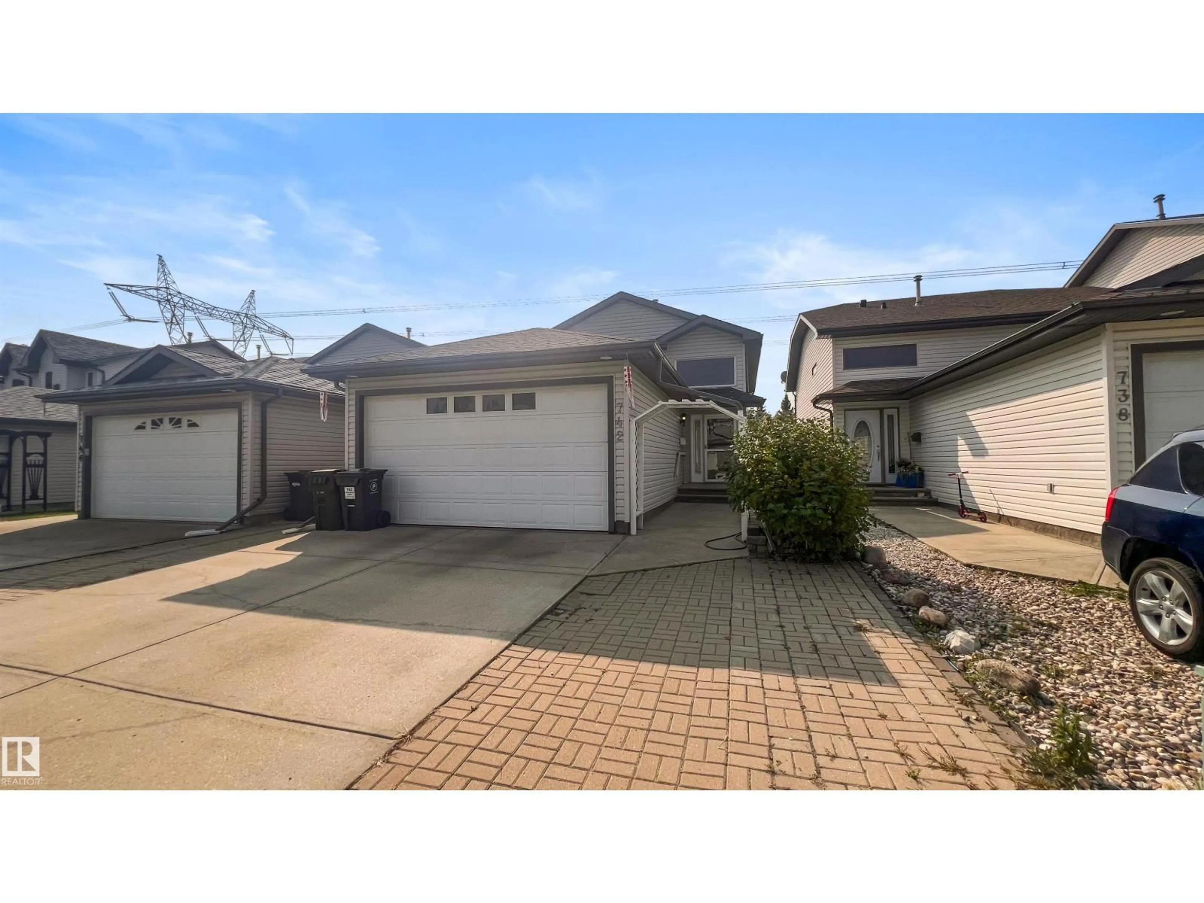 A pic from outside/outdoor area/front of a property/back of a property/a pic from drone, street for 742 KANANASKIS DR, Devon Alberta T9G2G8