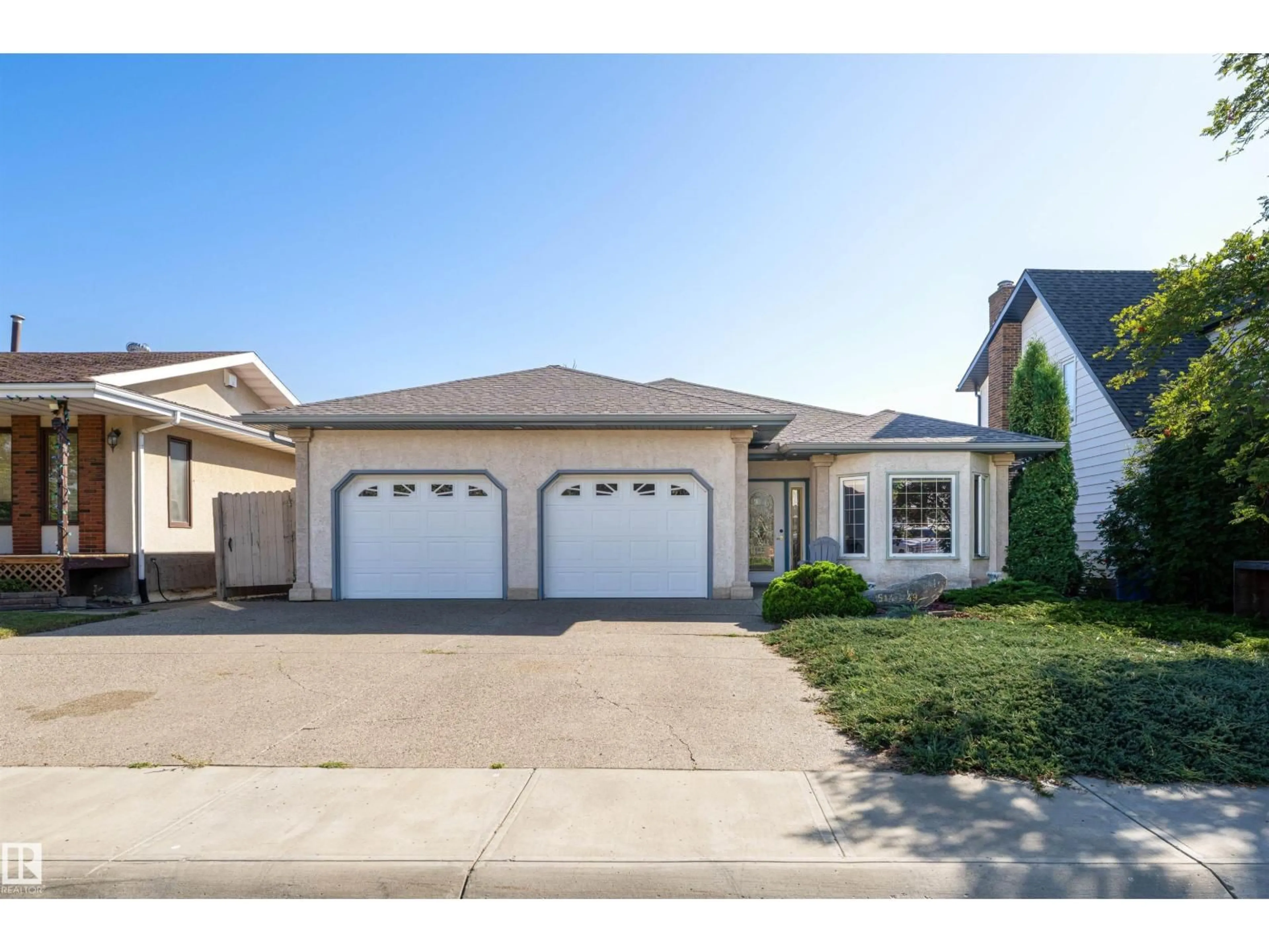 Home with vinyl exterior material, street for 5147 49 ST, Redwater Alberta T0A2W0