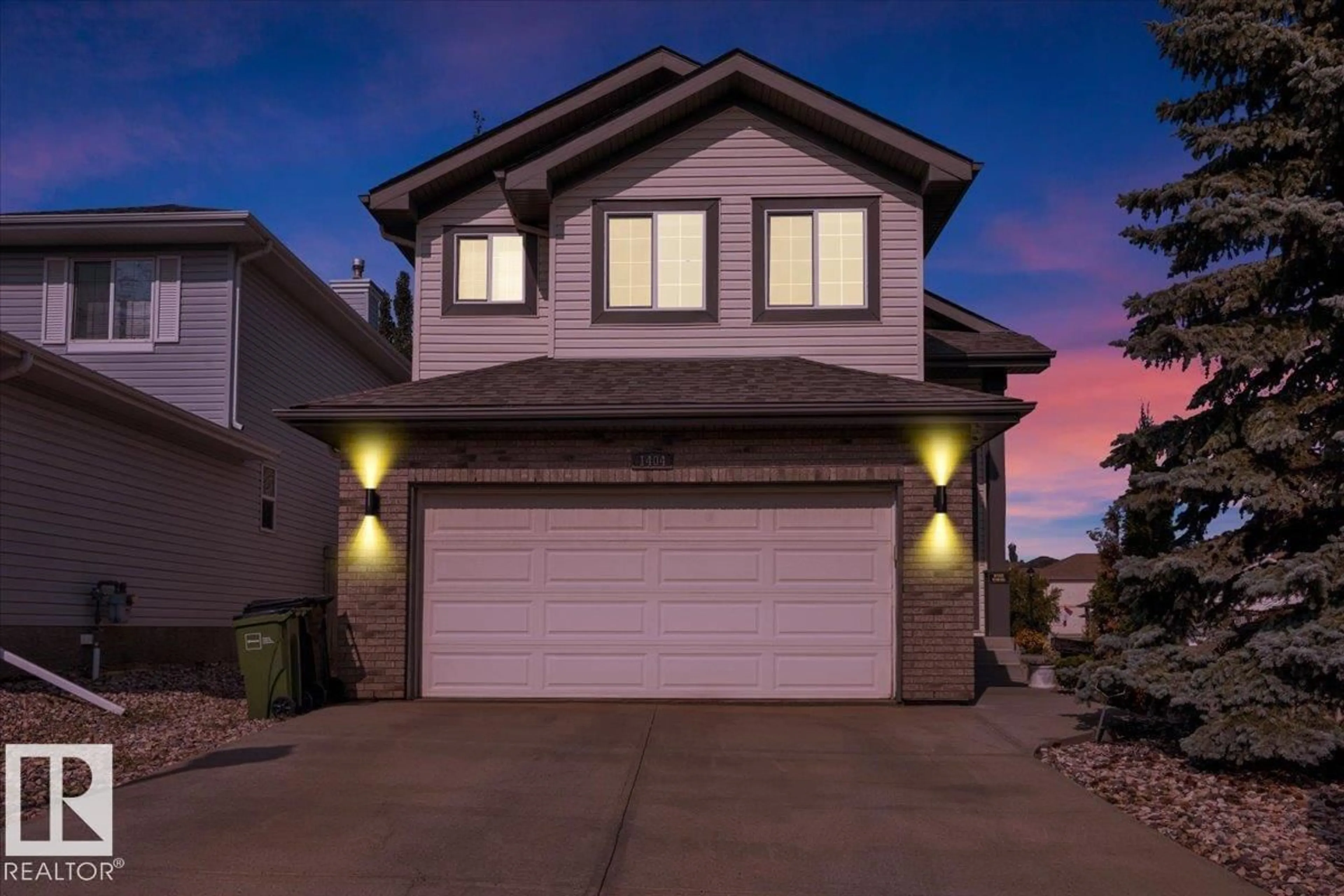 Home with vinyl exterior material, street for NW - 1404 LATTA CO, Edmonton Alberta T6R3N2