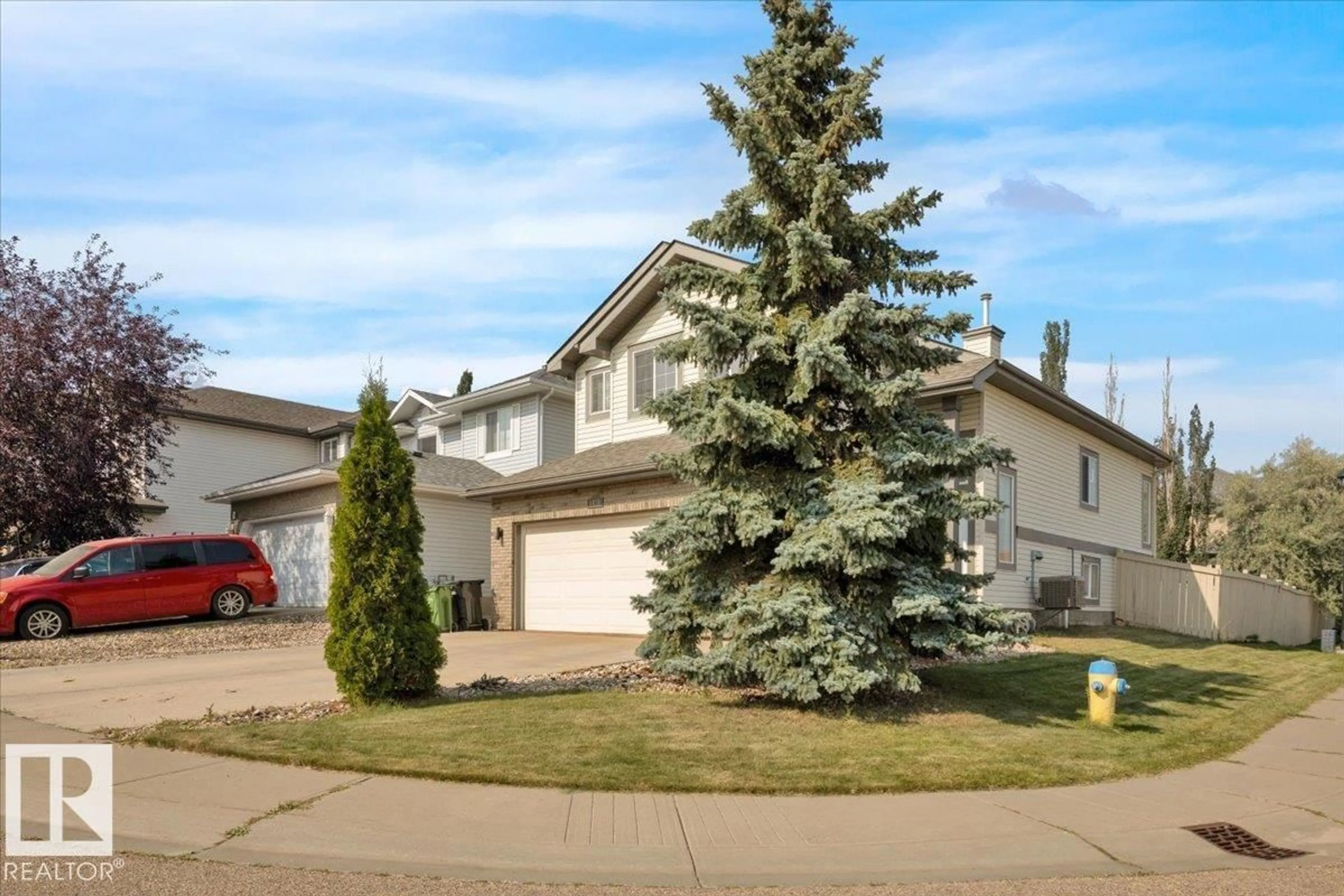 Home with vinyl exterior material, street for NW - 1404 LATTA CO, Edmonton Alberta T6R3N2