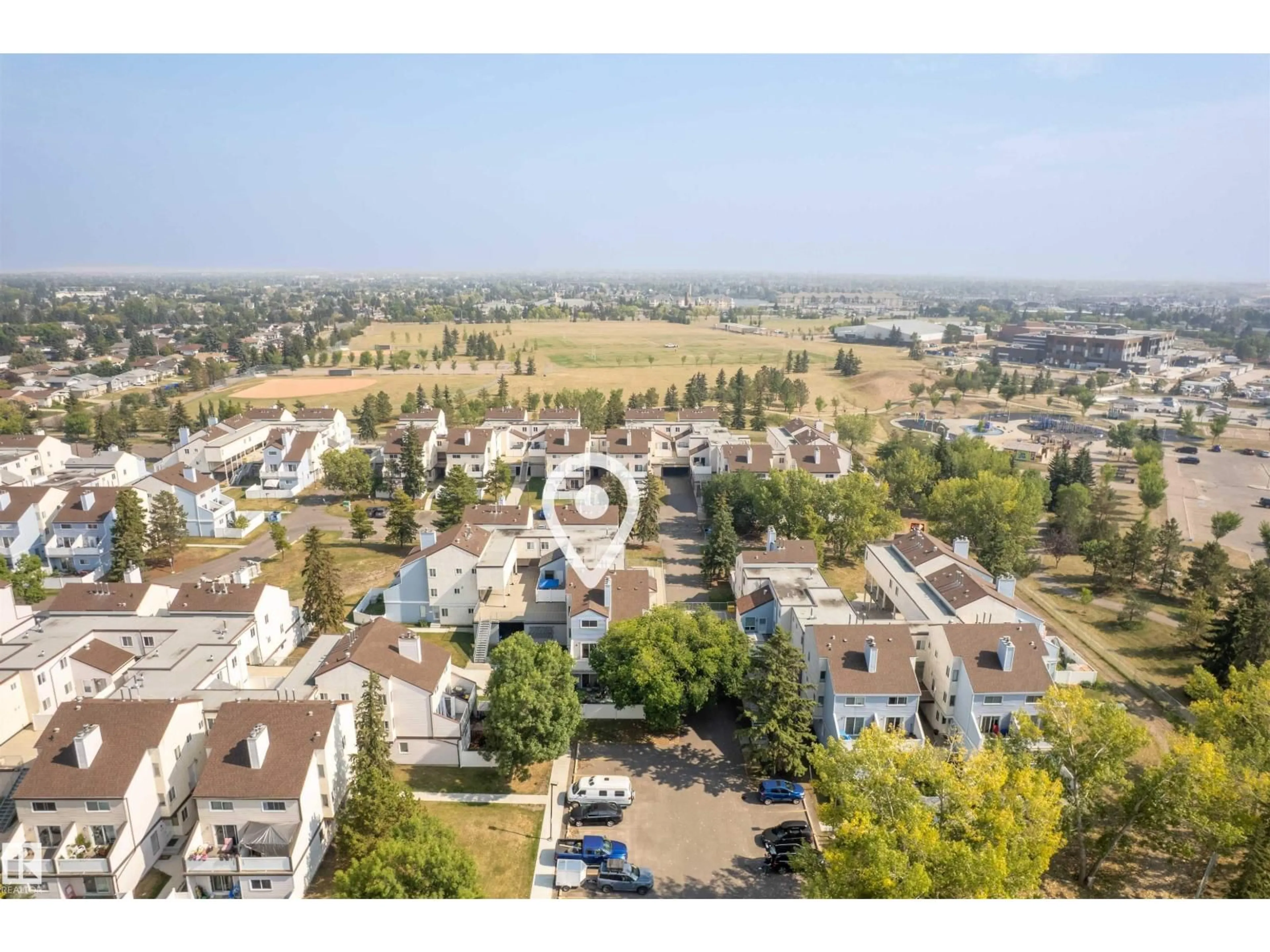 A pic from outside/outdoor area/front of a property/back of a property/a pic from drone, city buildings view from balcony for 225 LANCASTER TC, Edmonton Alberta T5X5T4