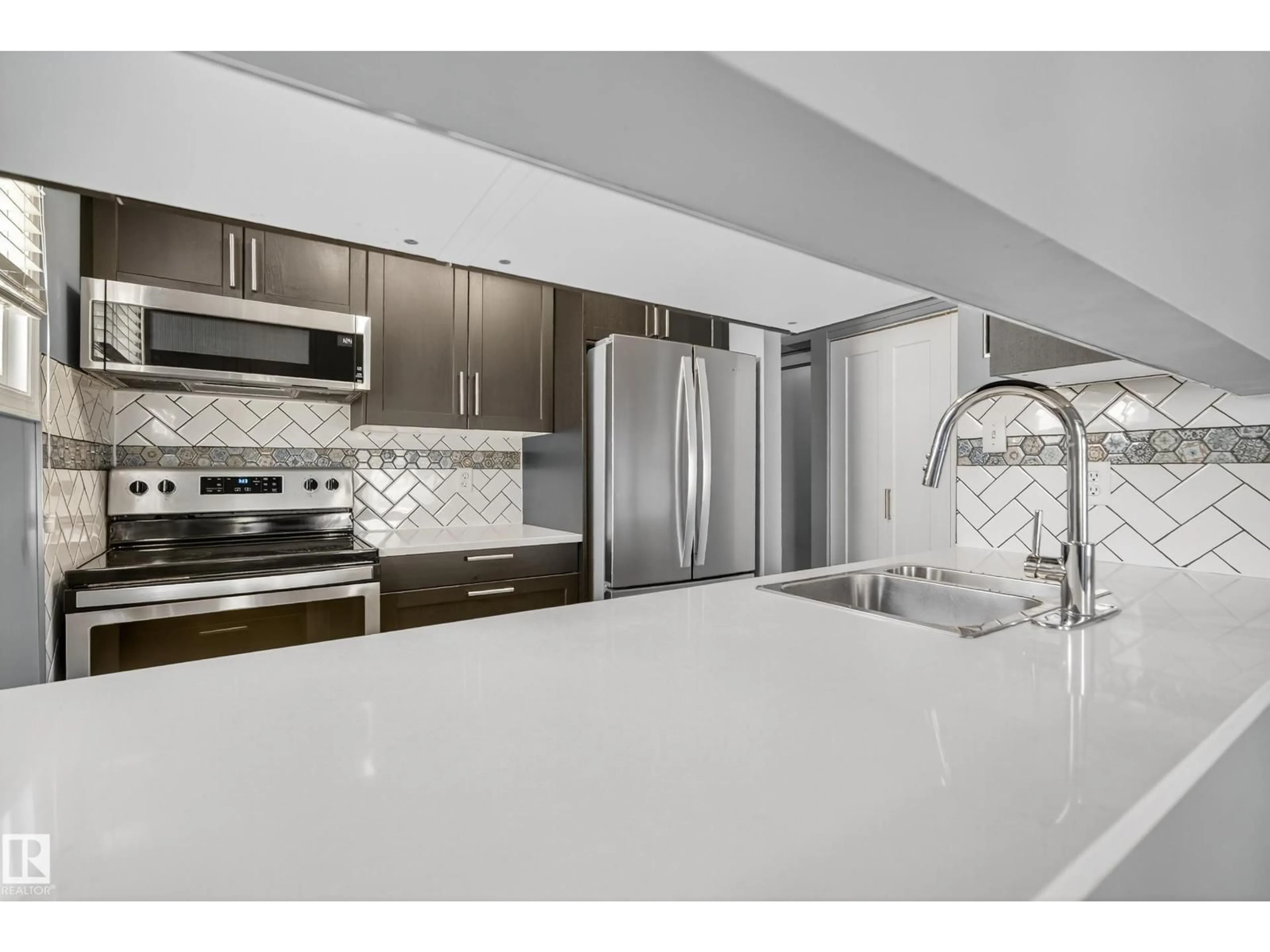 Open concept kitchen, ceramic/tile floor for 225 LANCASTER TC, Edmonton Alberta T5X5T4