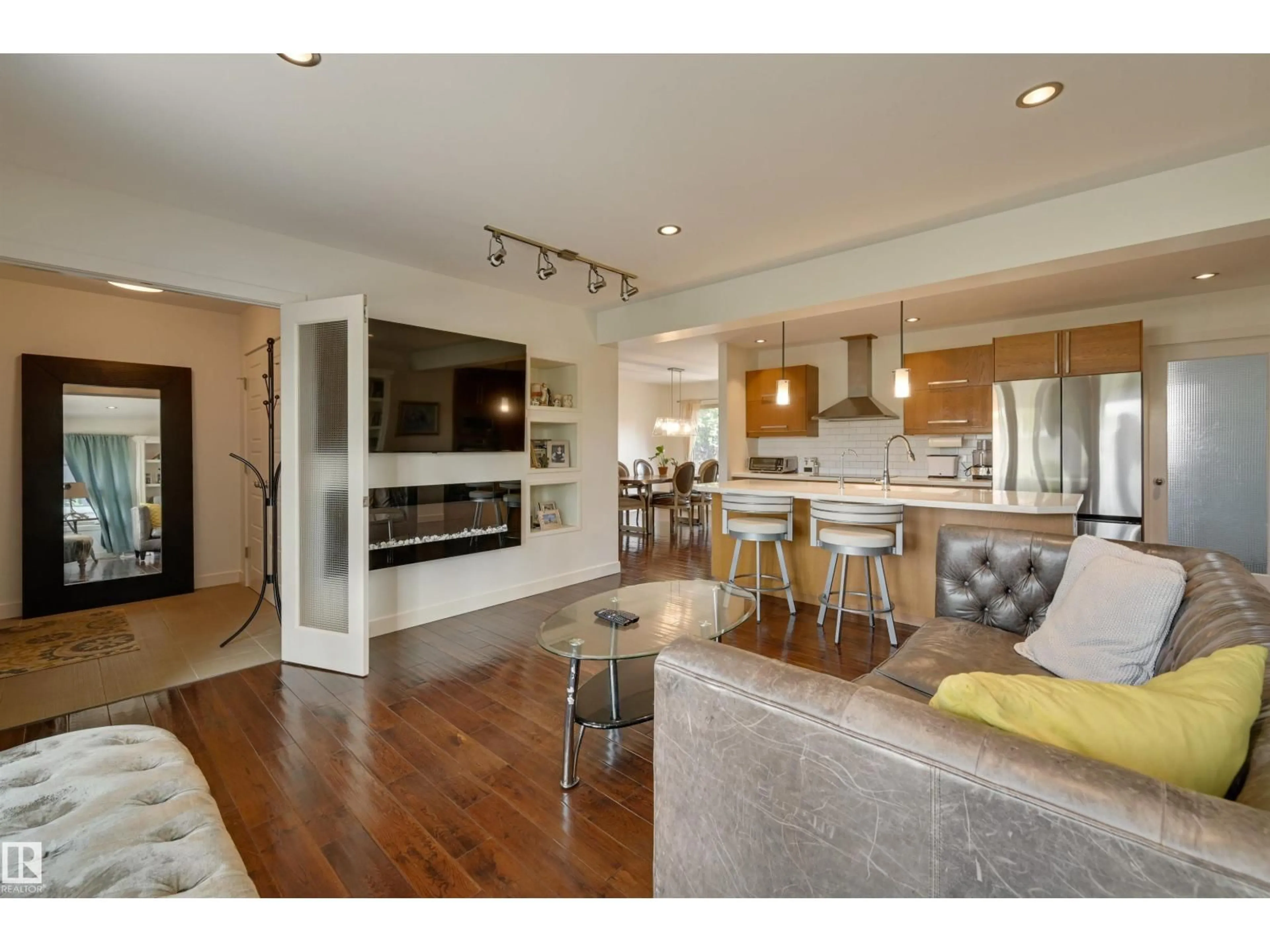 Open concept kitchen, wood/laminate floor for 9715 143A ST, Edmonton Alberta T5N2S8