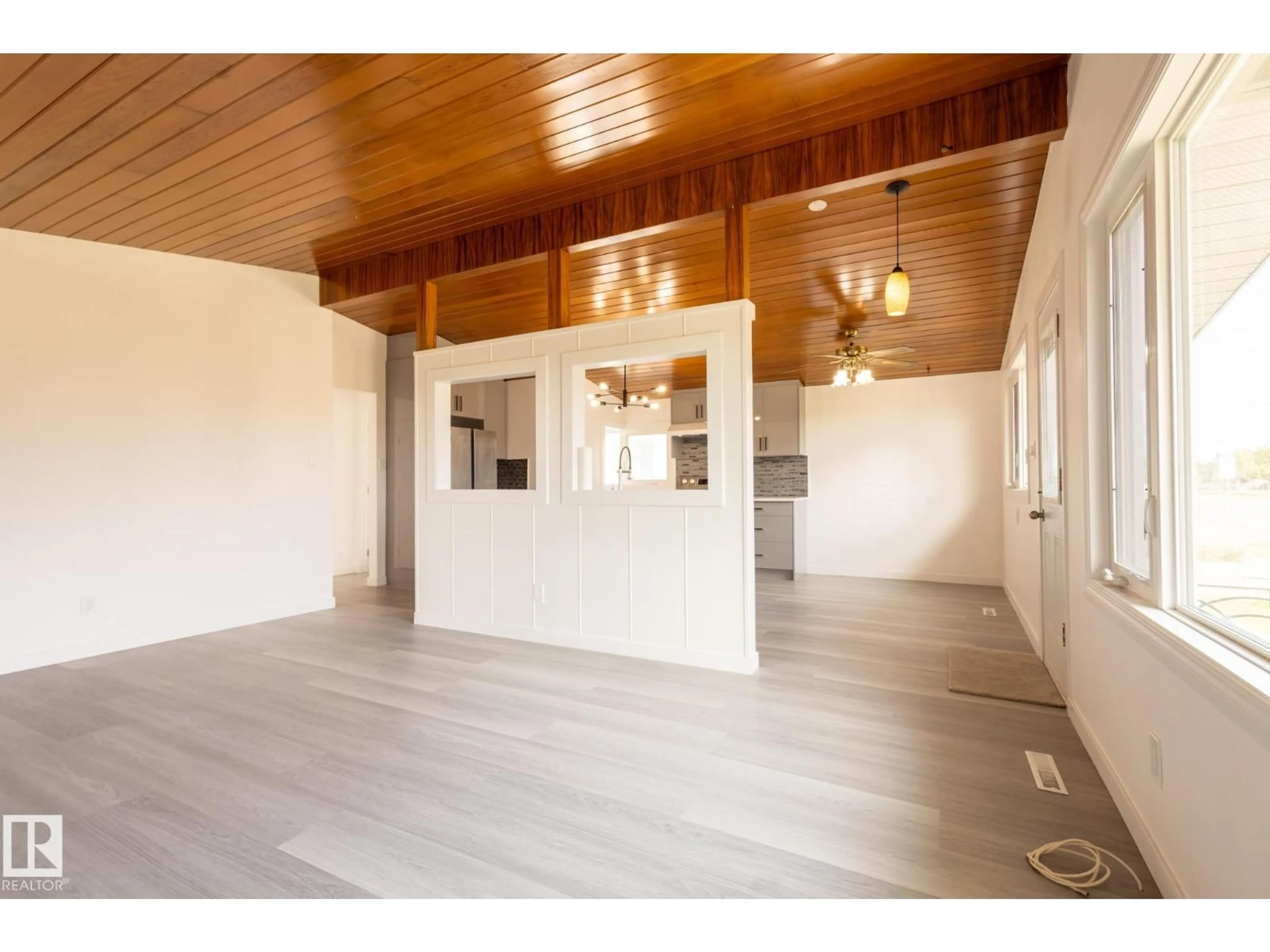 Open concept kitchen, wood/laminate floor for NW - 13340 94 ST, Edmonton Alberta T5E3V8