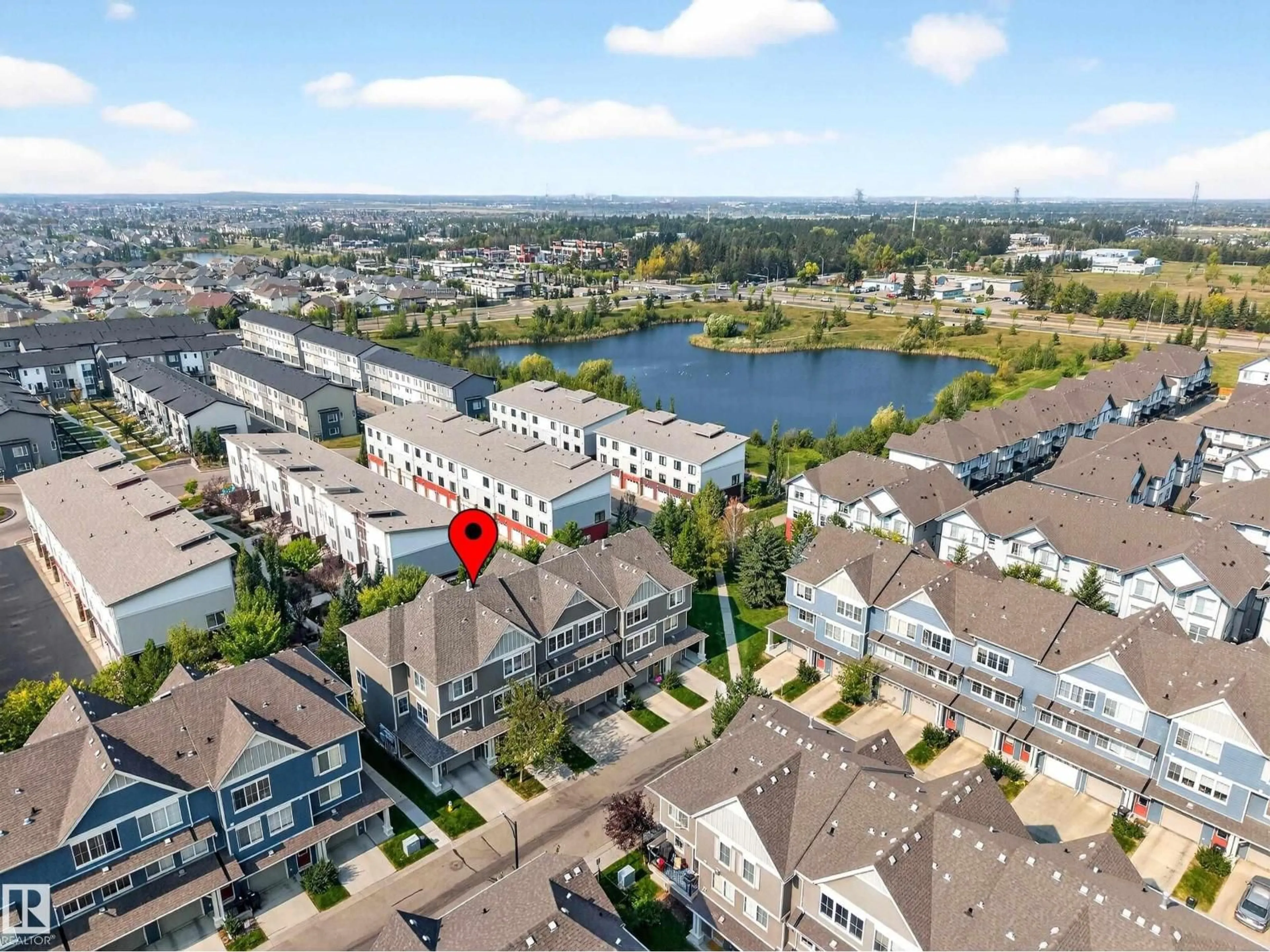 A pic from outside/outdoor area/front of a property/back of a property/a pic from drone, water/lake/river/ocean view for #65 - 603 WATT BV, Edmonton Alberta T6X0P3