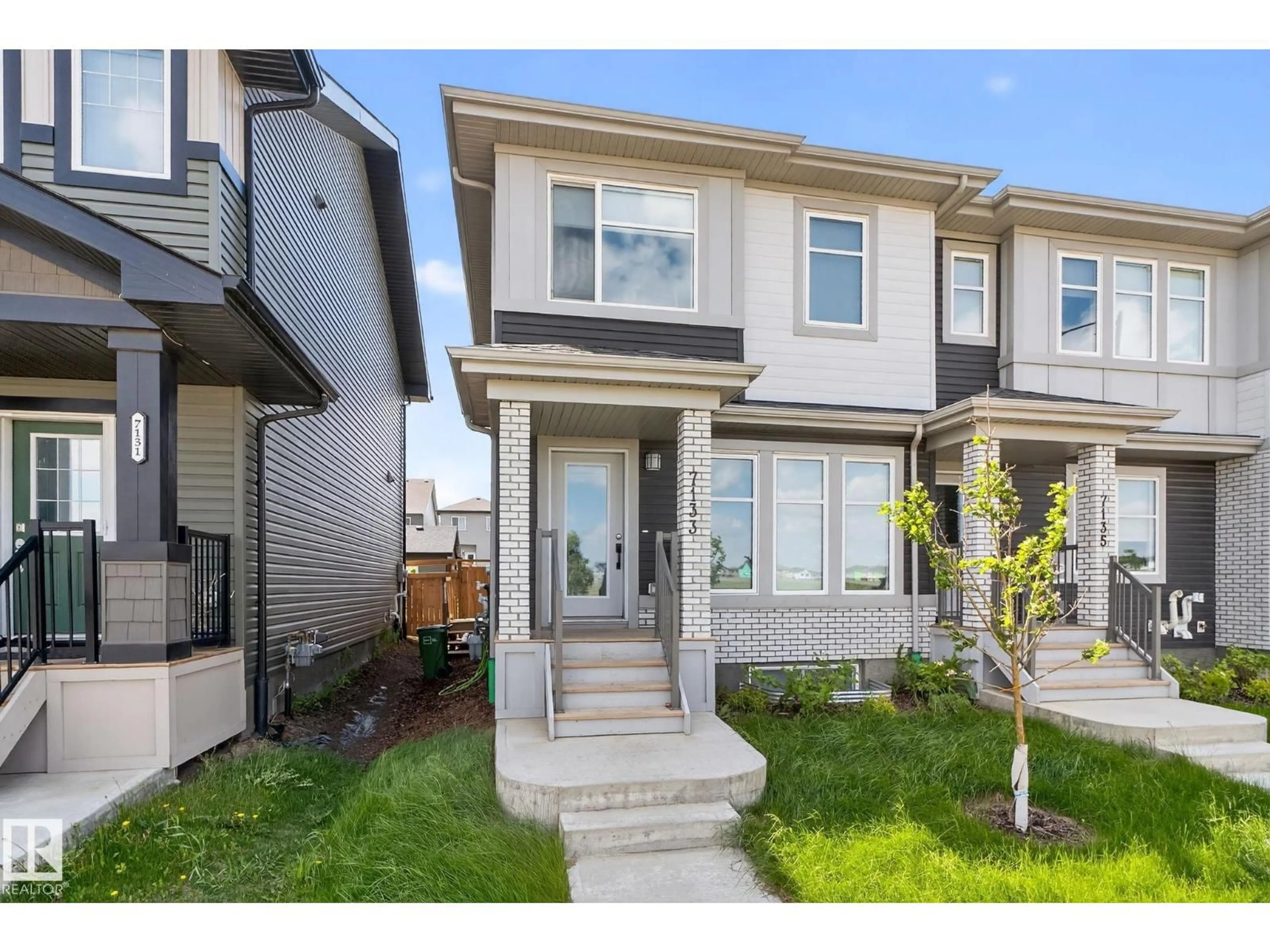 Home with vinyl exterior material, street for NW - 7133 178 AV, Edmonton Alberta T5Z0T8