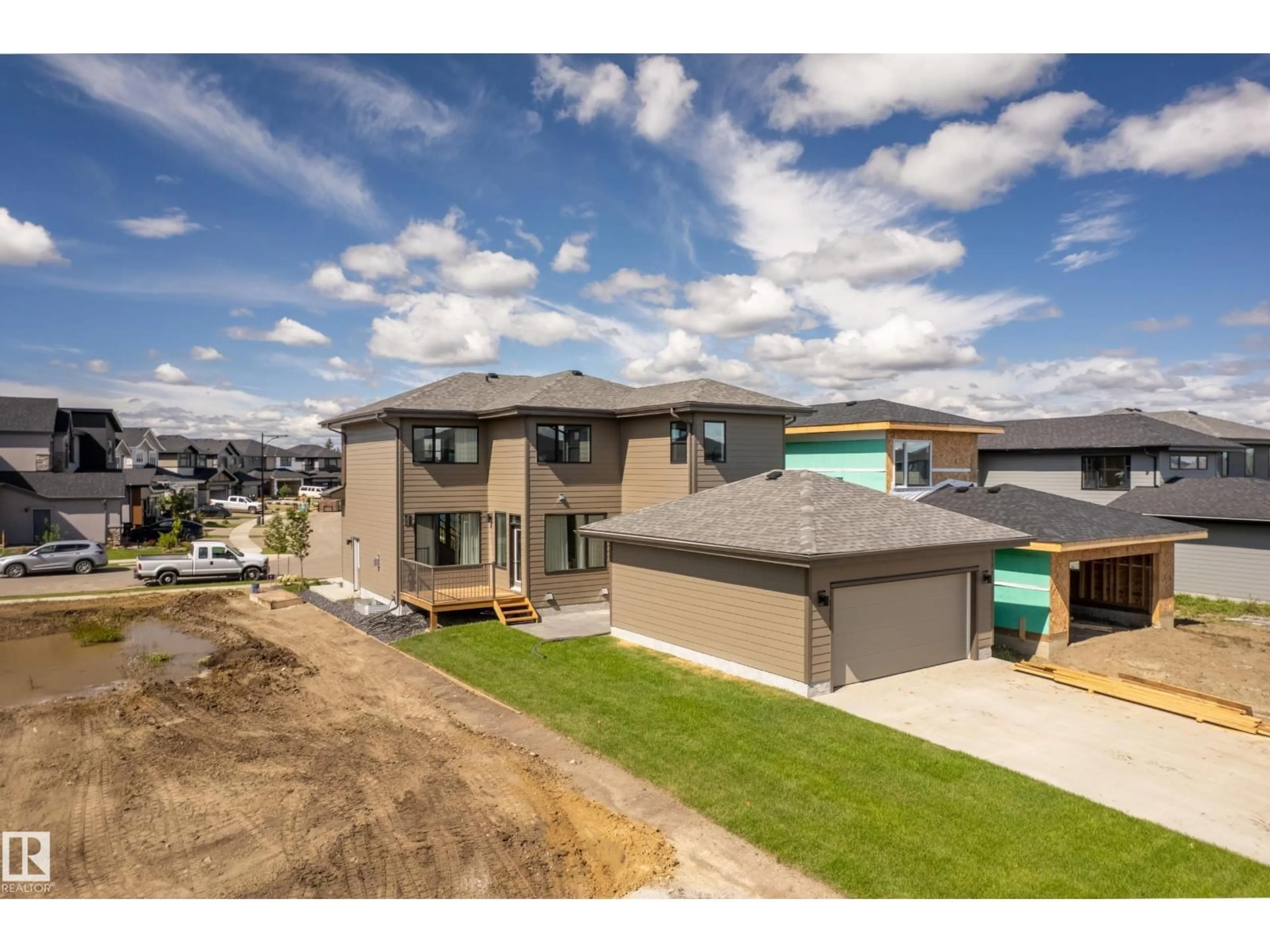A pic from outside/outdoor area/front of a property/back of a property/a pic from drone, mountain view for SW - 4545 KNIGHT WD, Edmonton Alberta T6W4V6