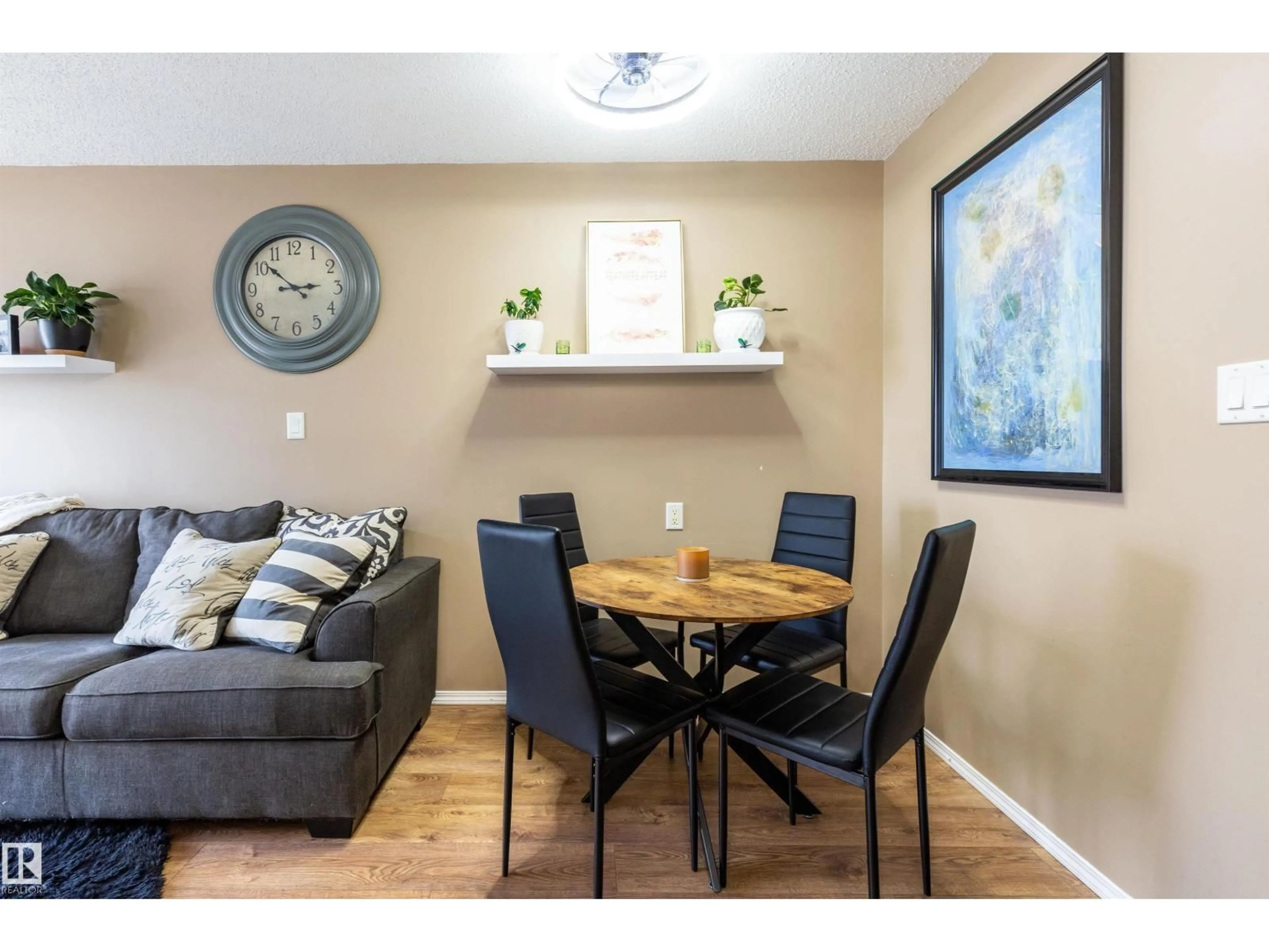 Living room with furniture, wood/laminate floor for #45 - 451 HYNDMAN CR, Edmonton Alberta T5A5J3