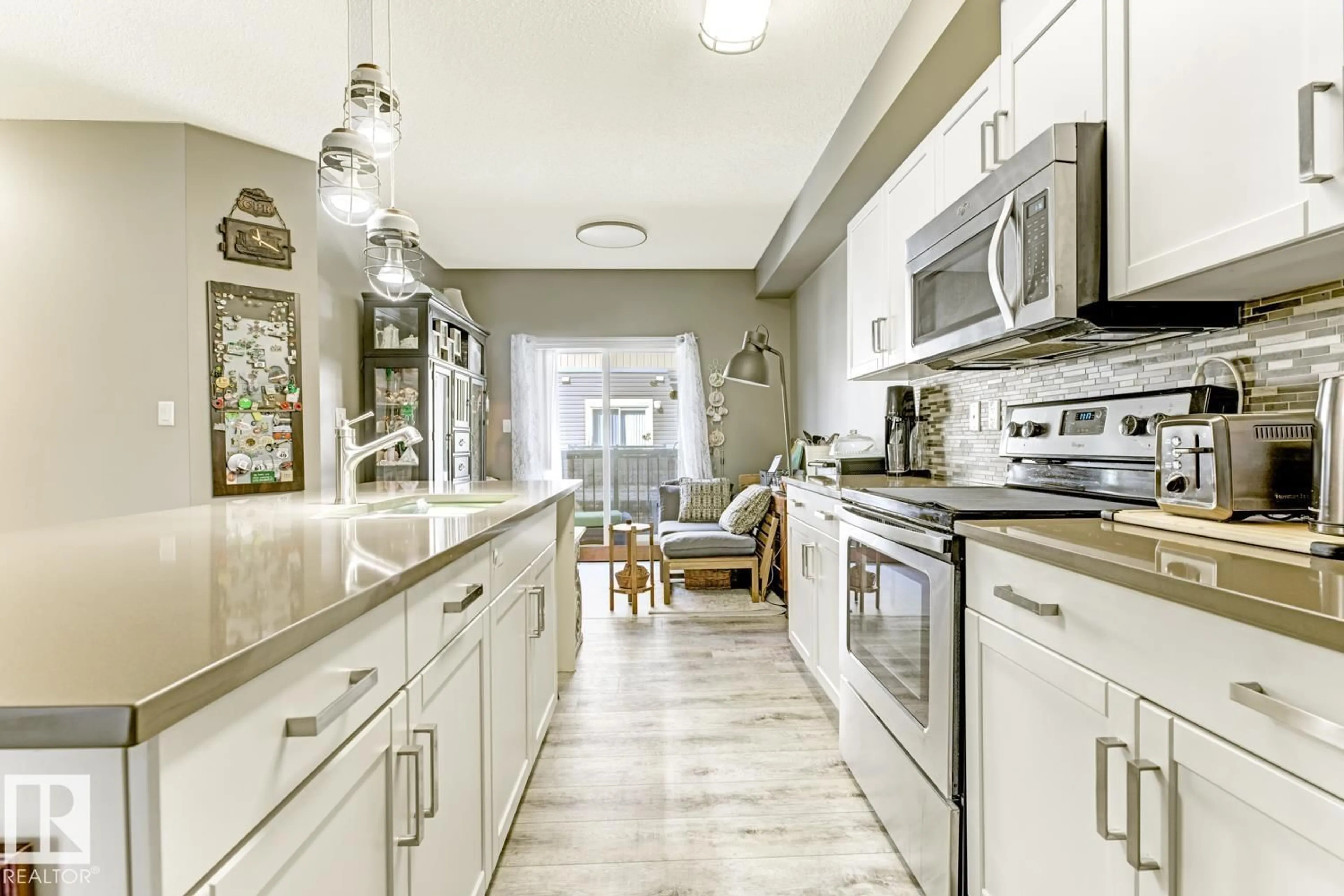 Open concept kitchen, ceramic/tile floor for #6 - 1030 CHAPPELLE BV, Edmonton Alberta T6W2K7