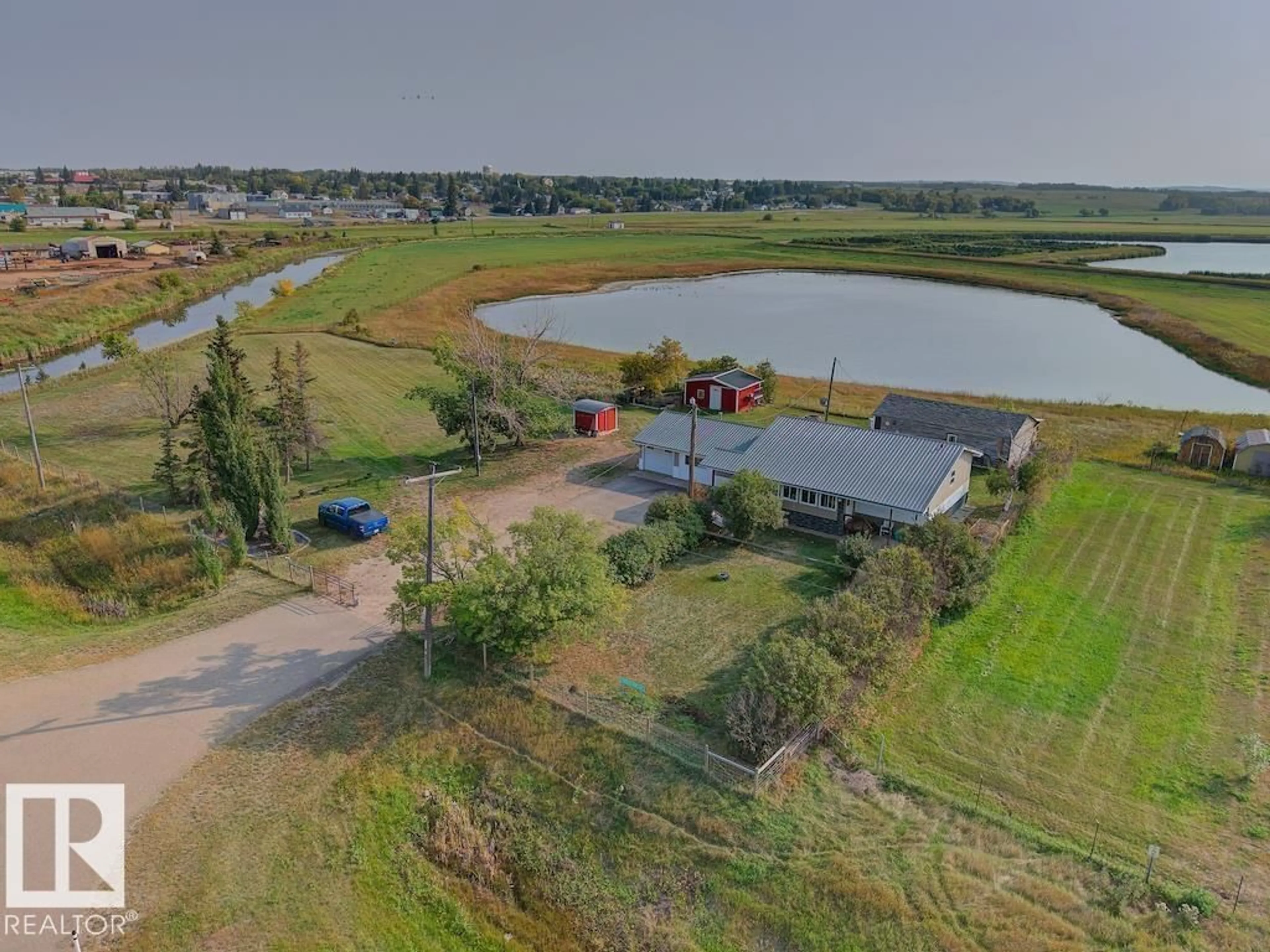 A pic from outside/outdoor area/front of a property/back of a property/a pic from drone, water/lake/river/ocean view for 545019 HIWAY 36, Rural Two Hills County Alberta T0B4K0