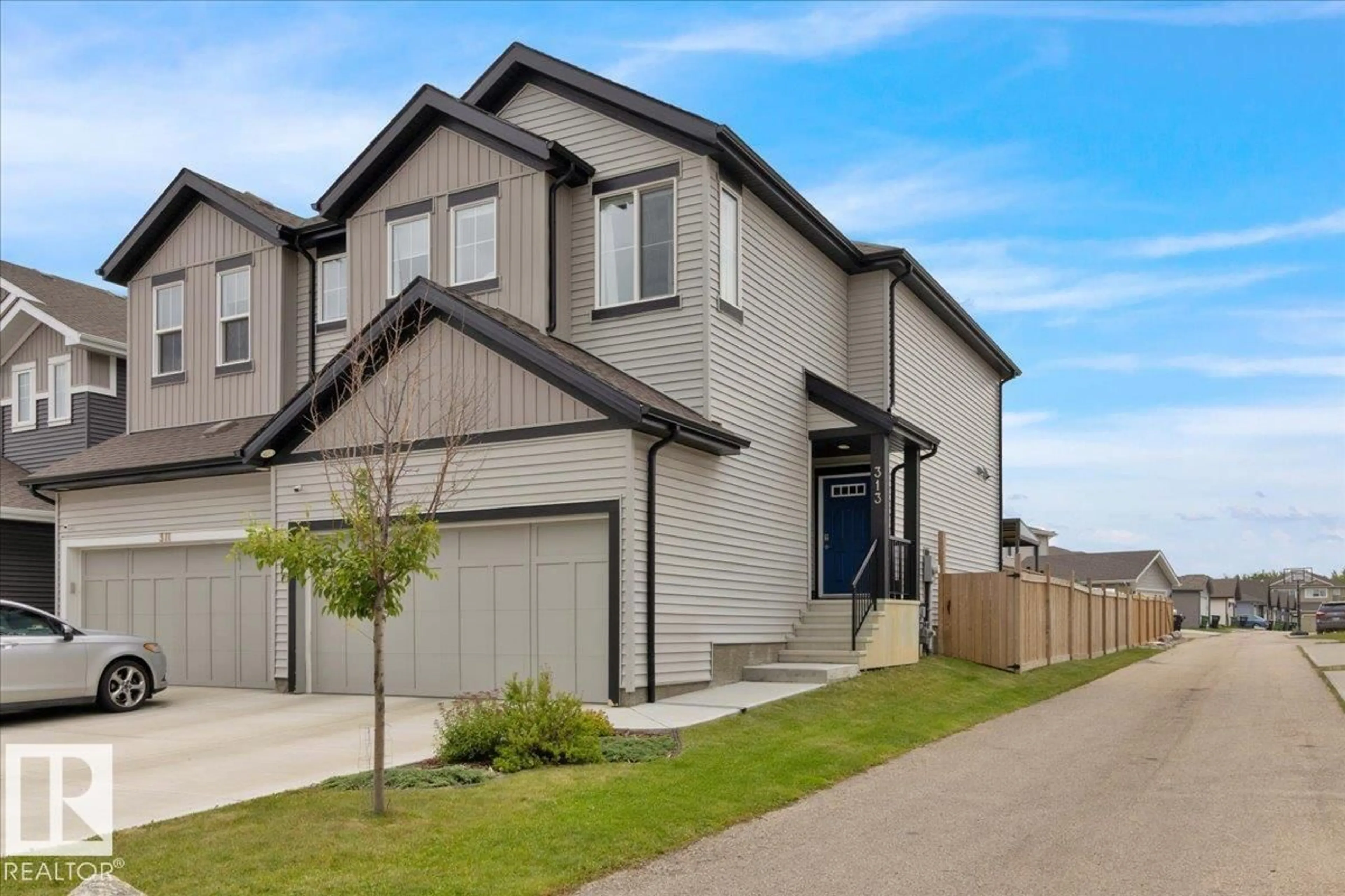 Home with brick exterior material, street for 313 40A AV, Edmonton Alberta T6T2E9