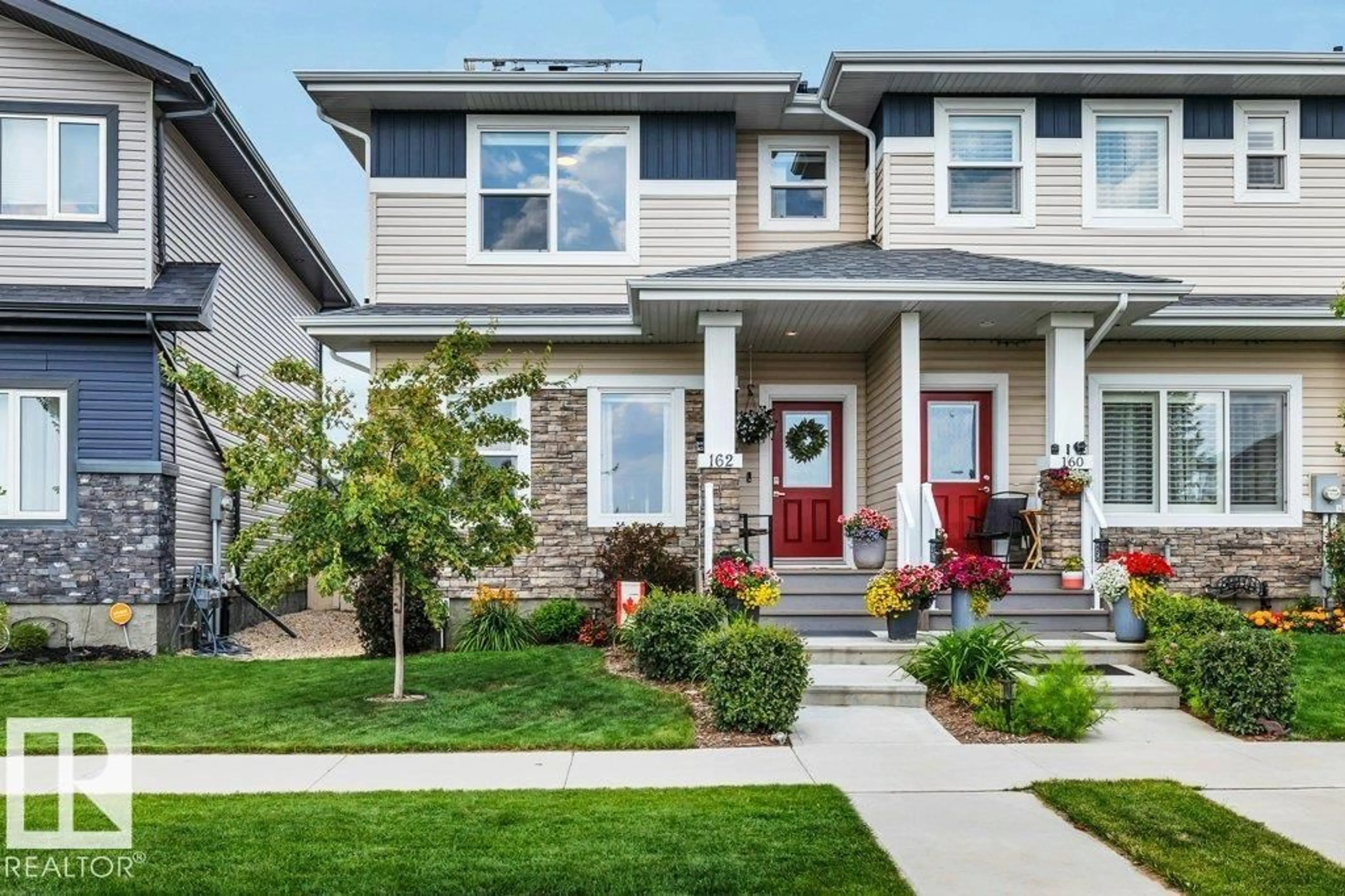 Home with vinyl exterior material, street for 162 DANSEREAU WY, Beaumont Alberta T4X2Y5