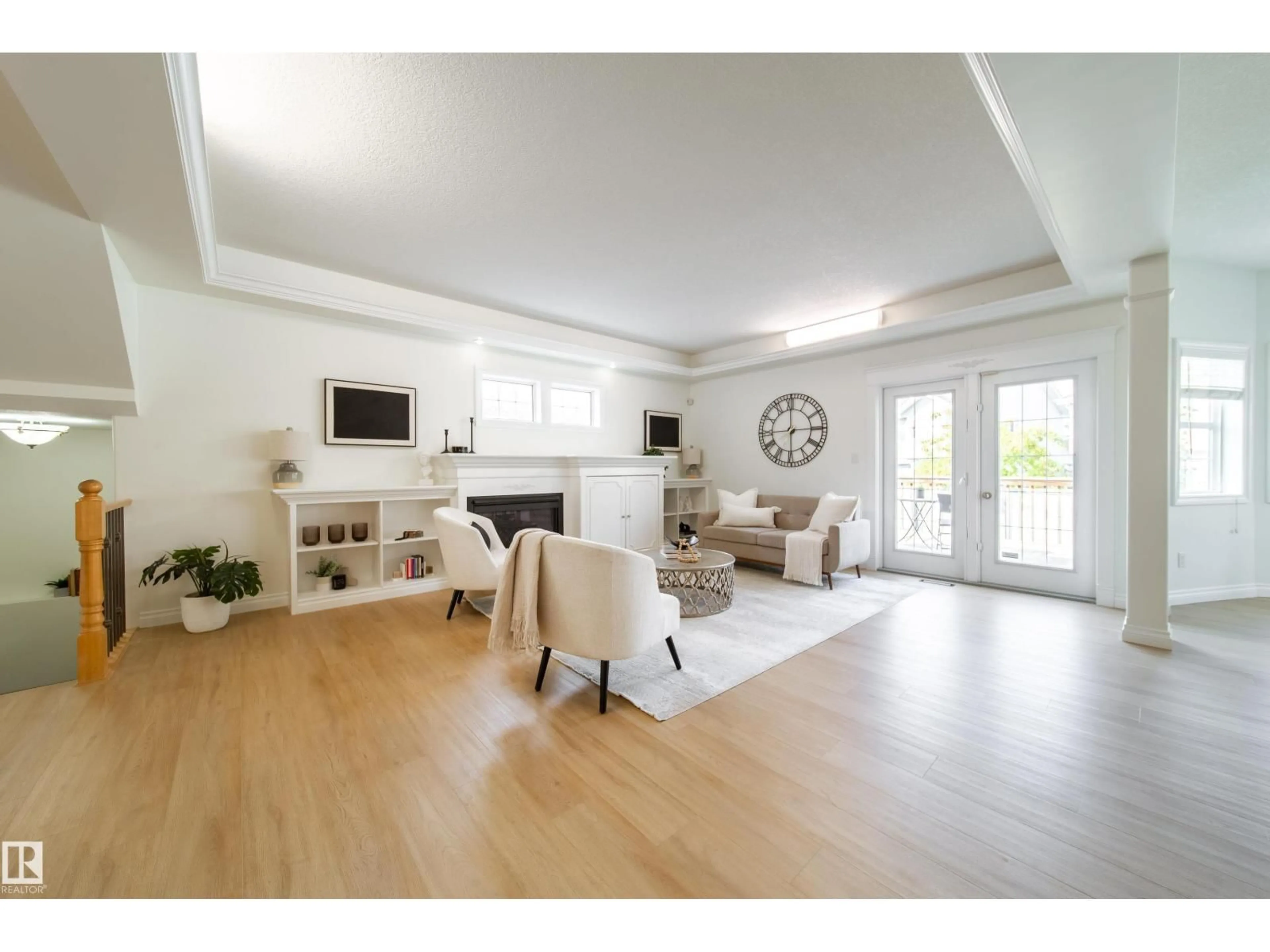 Living room with furniture, wood/laminate floor for 452 SPARLING CO, Edmonton Alberta T6X1G9