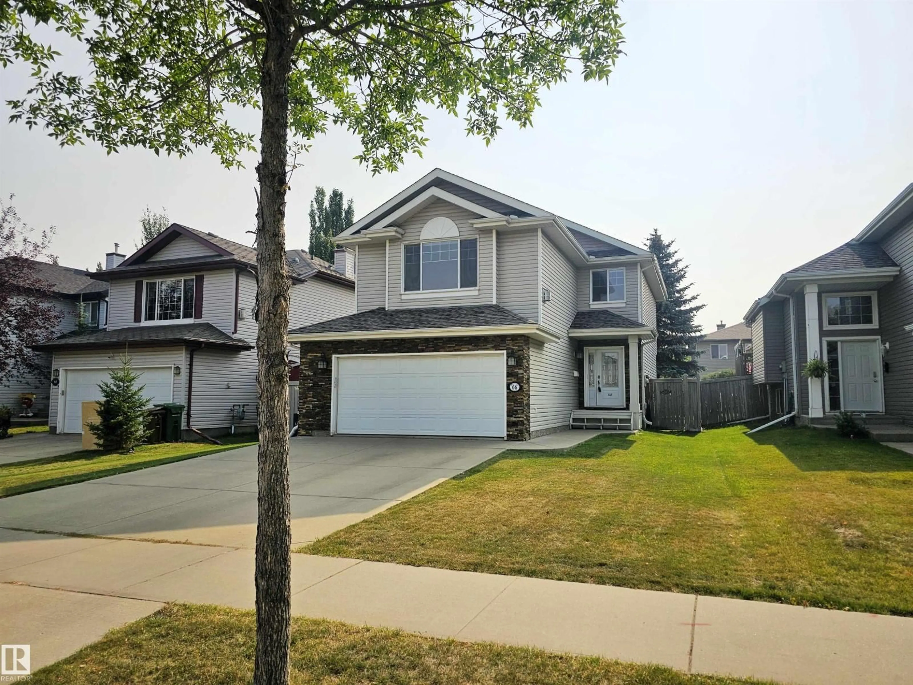 Home with vinyl exterior material, street for 66 ERIN RIDGE DR, St. Albert Alberta T8N7H1