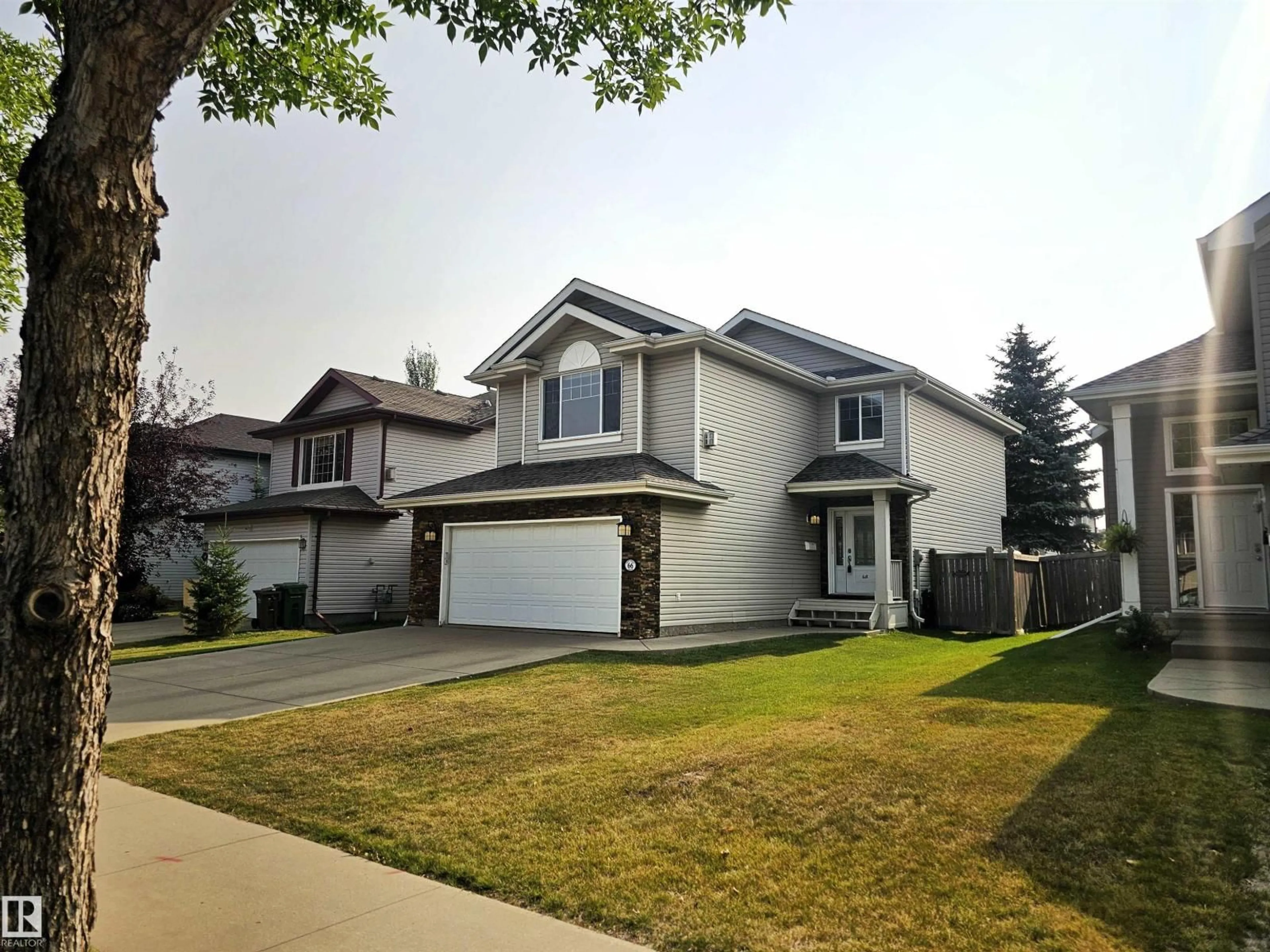 Home with vinyl exterior material, street for 66 ERIN RIDGE DR, St. Albert Alberta T8N7H1