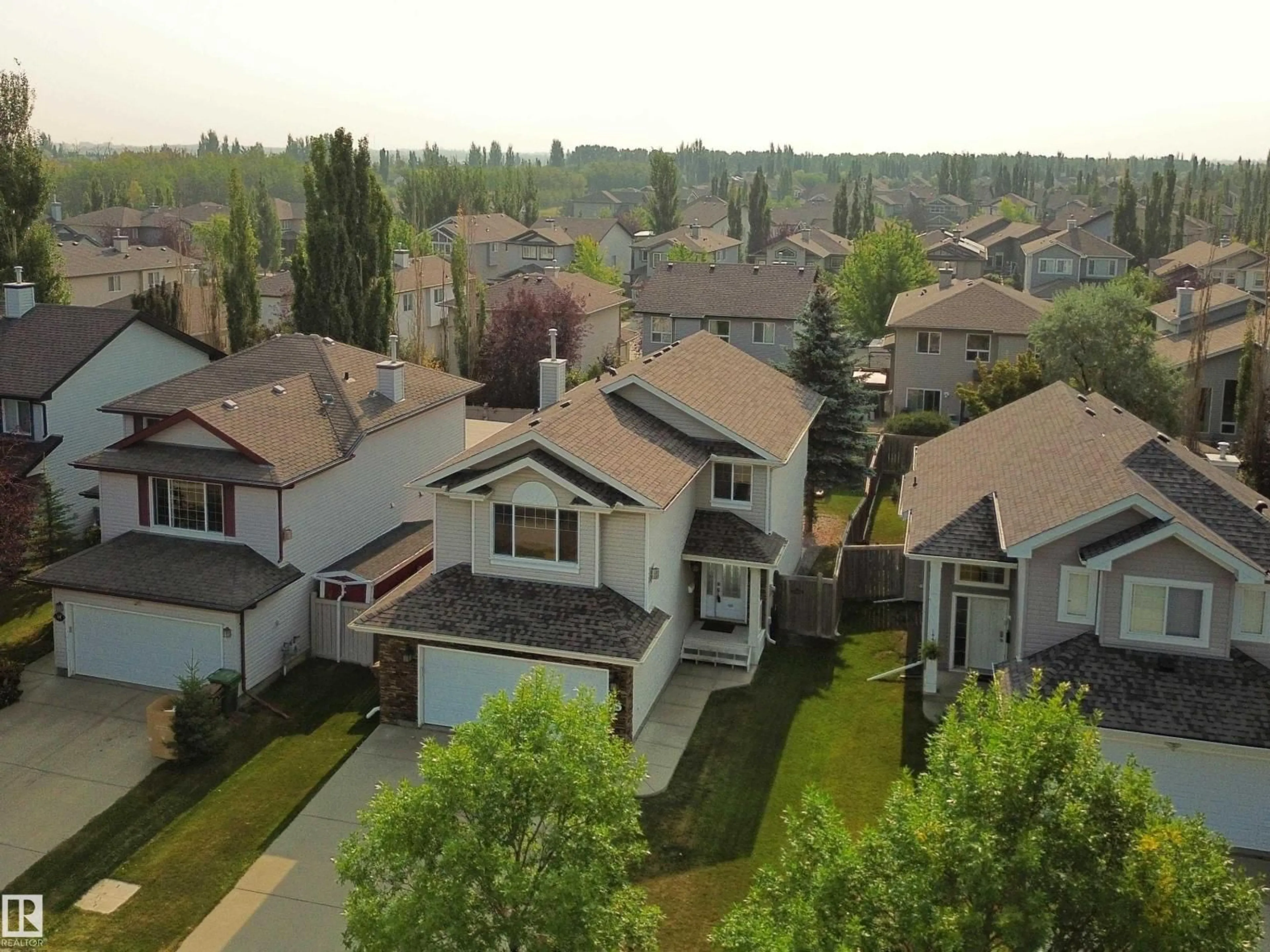 A pic from outside/outdoor area/front of a property/back of a property/a pic from drone, street for 66 ERIN RIDGE DR, St. Albert Alberta T8N7H1
