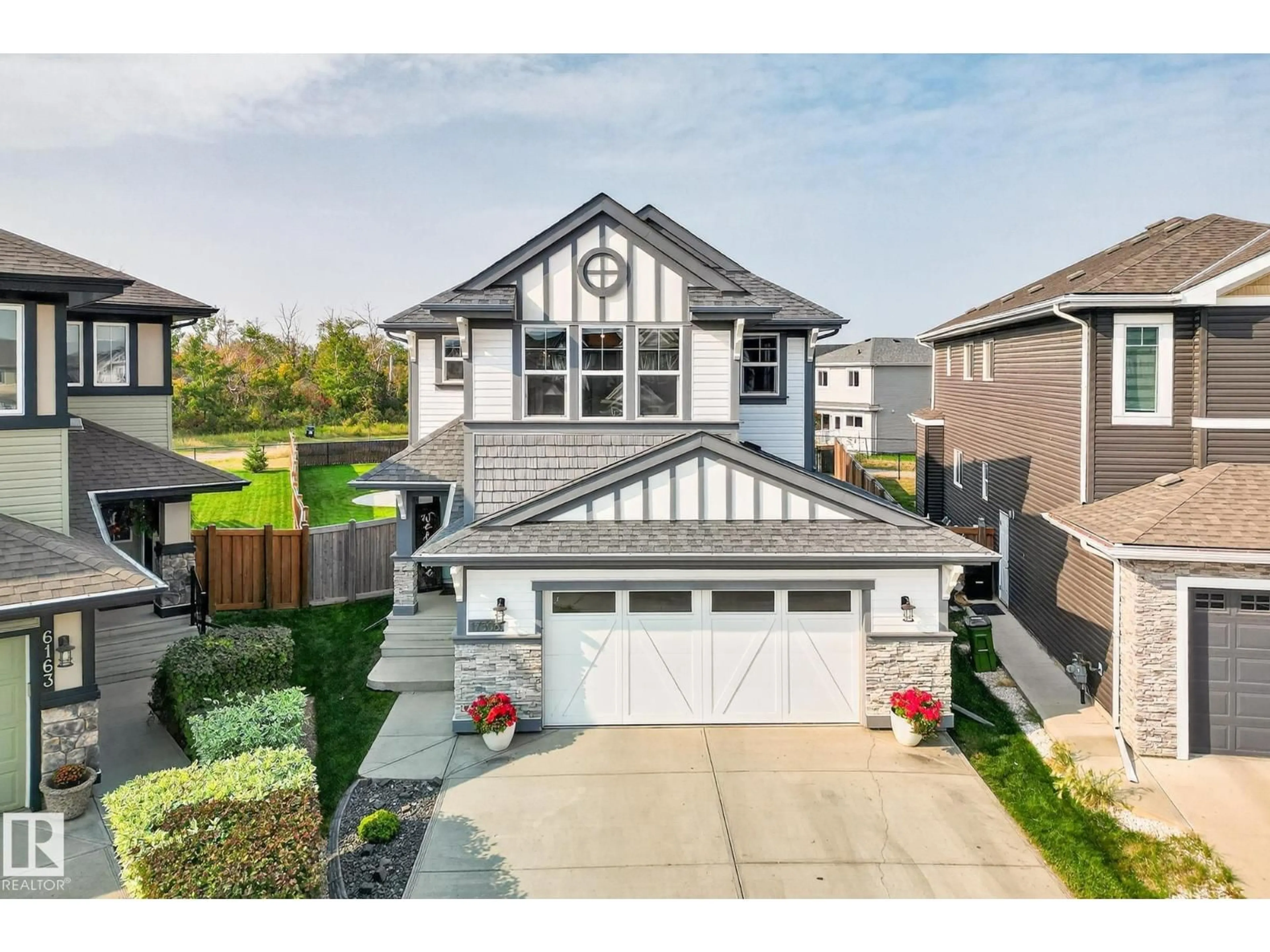 Home with vinyl exterior material, street for 17506 61A ST, Edmonton Alberta T5Y3P2