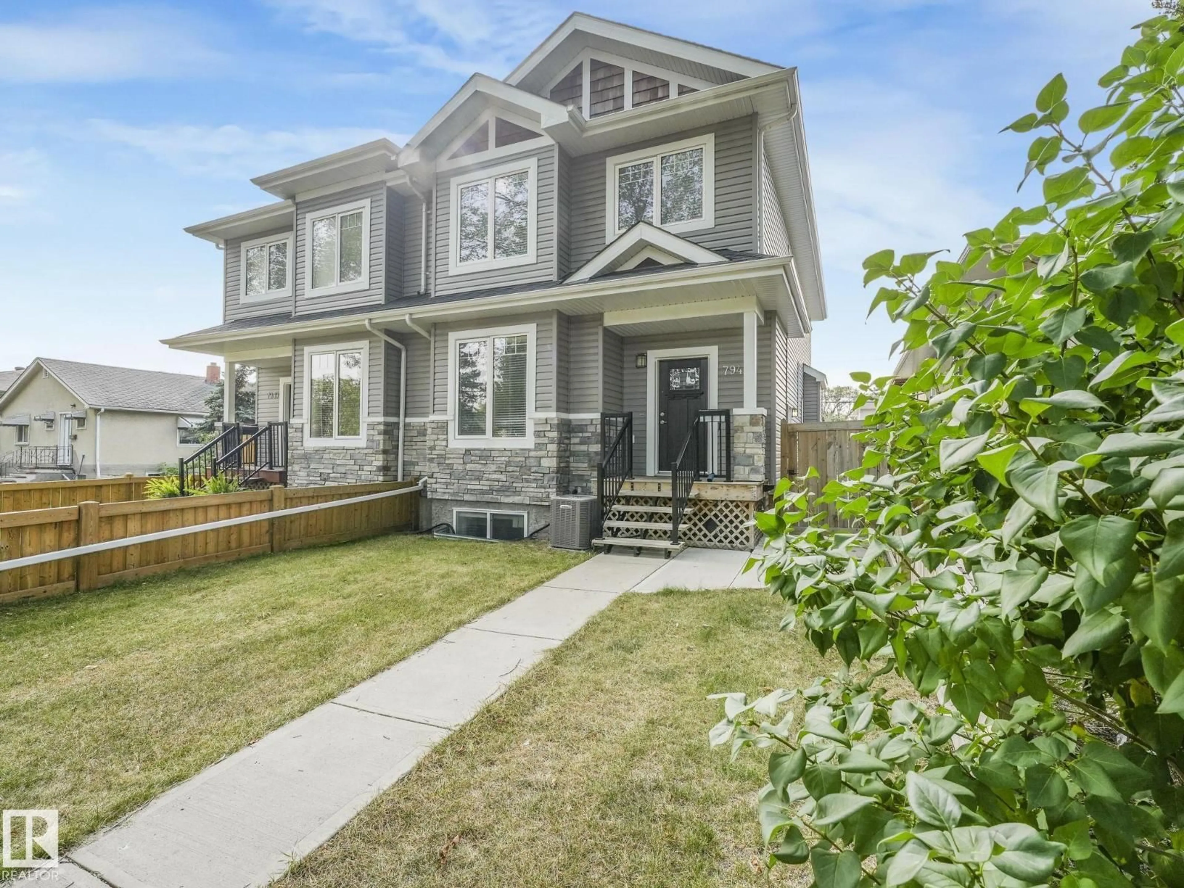 Home with vinyl exterior material, street for 7941 83 AV, Edmonton Alberta T6C1A5