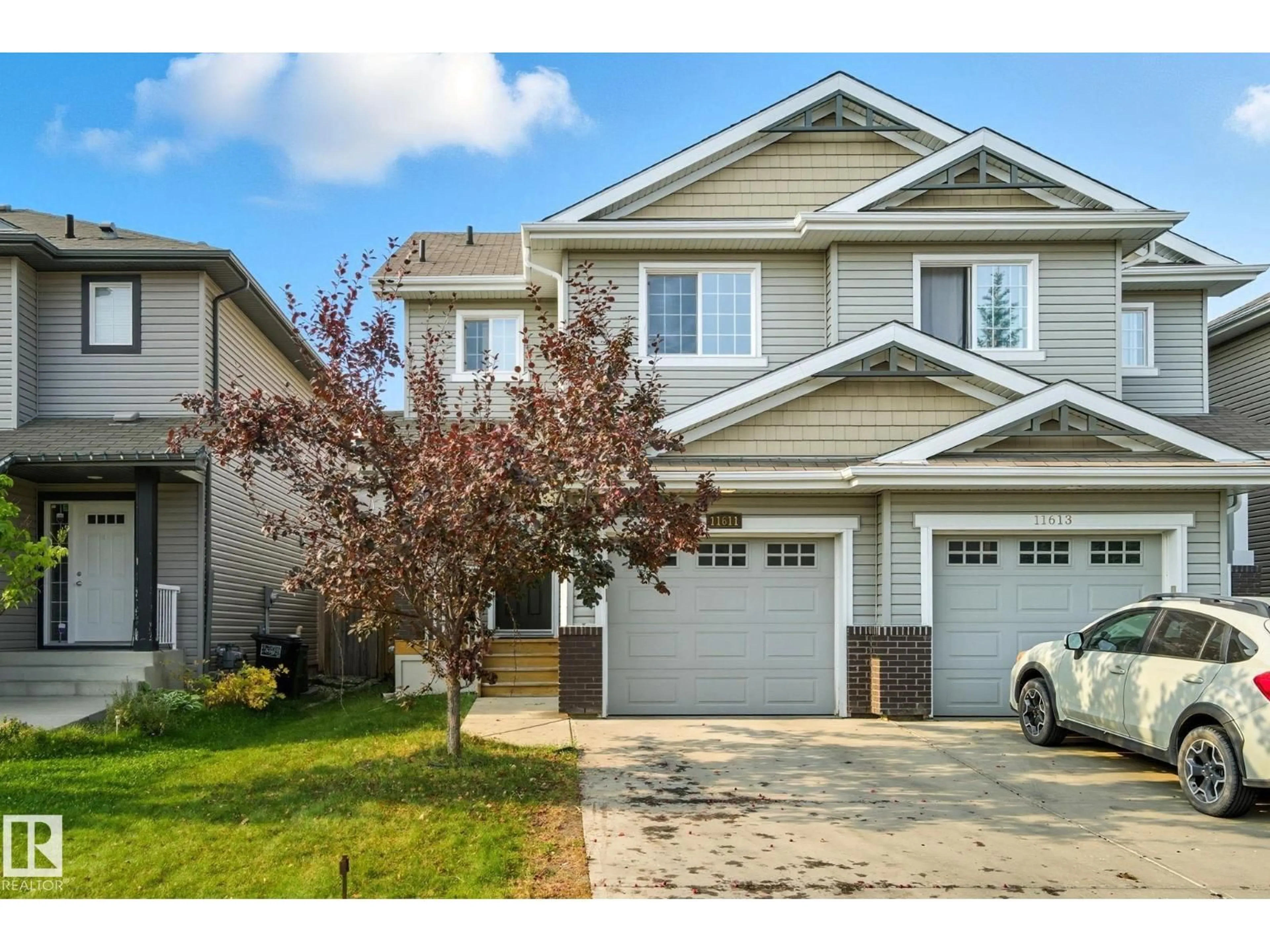 Home with vinyl exterior material, street for 11611 17 AV, Edmonton Alberta T6W1Y4