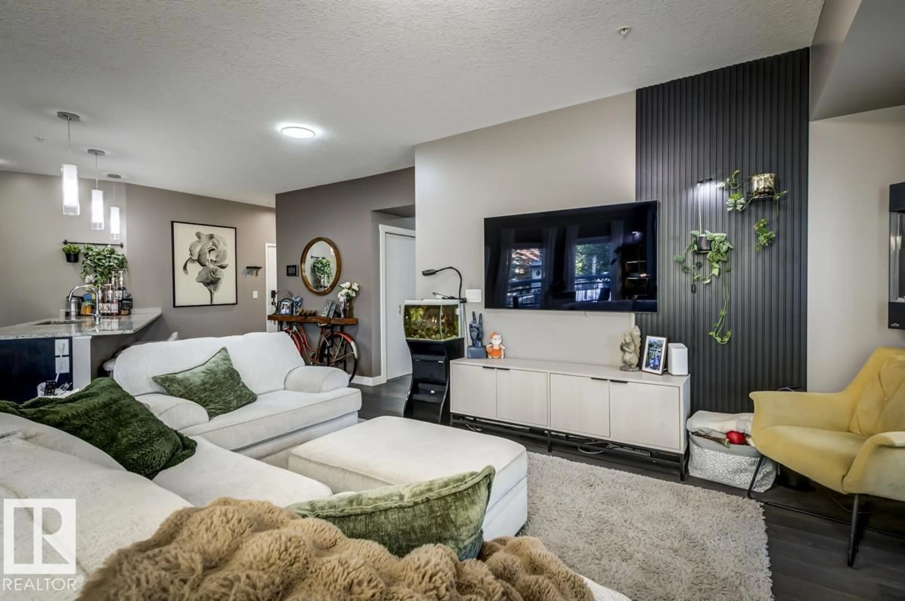 Living room with furniture, unknown for #103 - 10126 144 ST, Edmonton Alberta T5N2T7