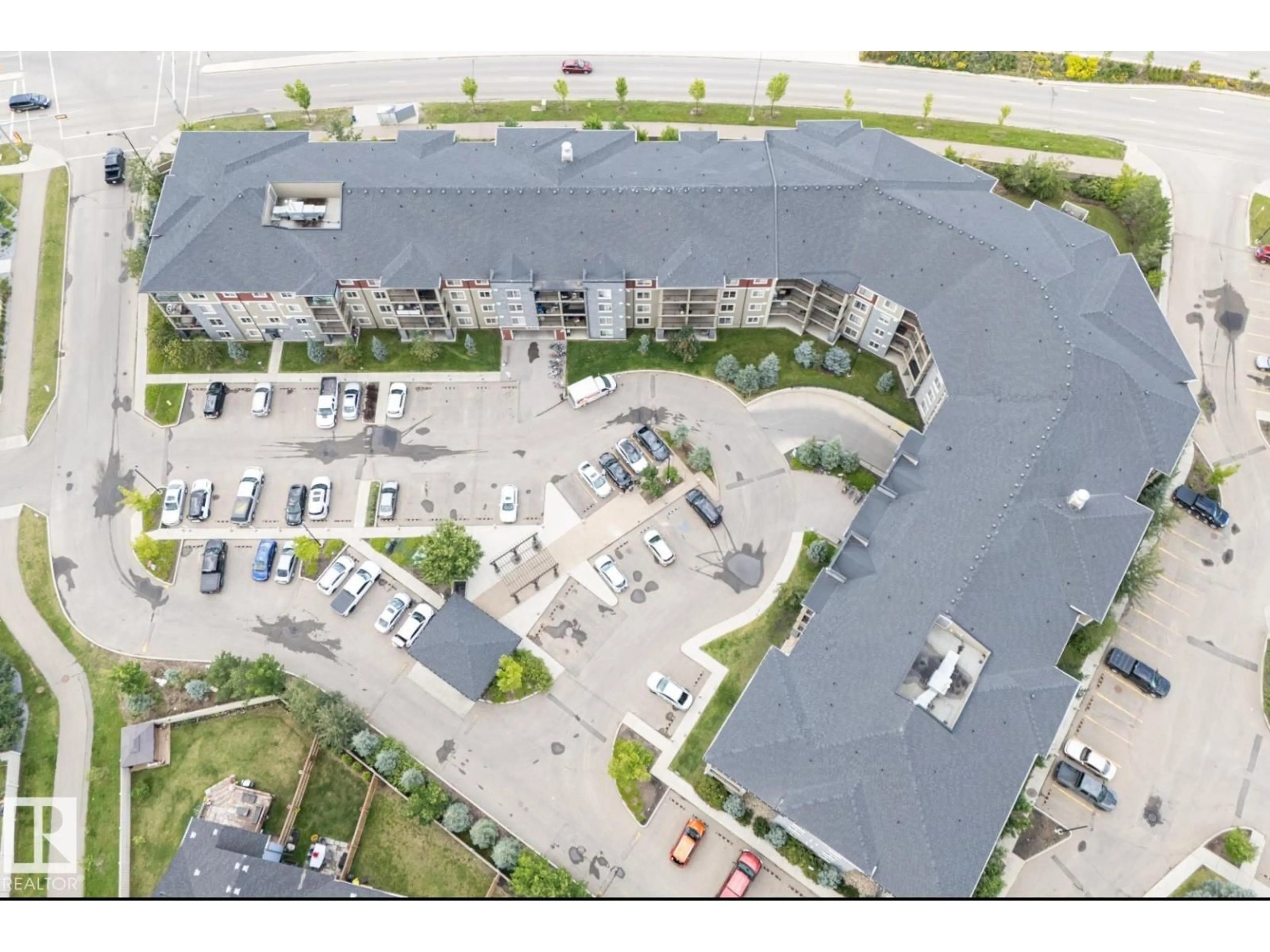 A pic from outside/outdoor area/front of a property/back of a property/a pic from drone, street for #124 - 3315 JAMES MOWATT TR, Edmonton Alberta T6W3L9