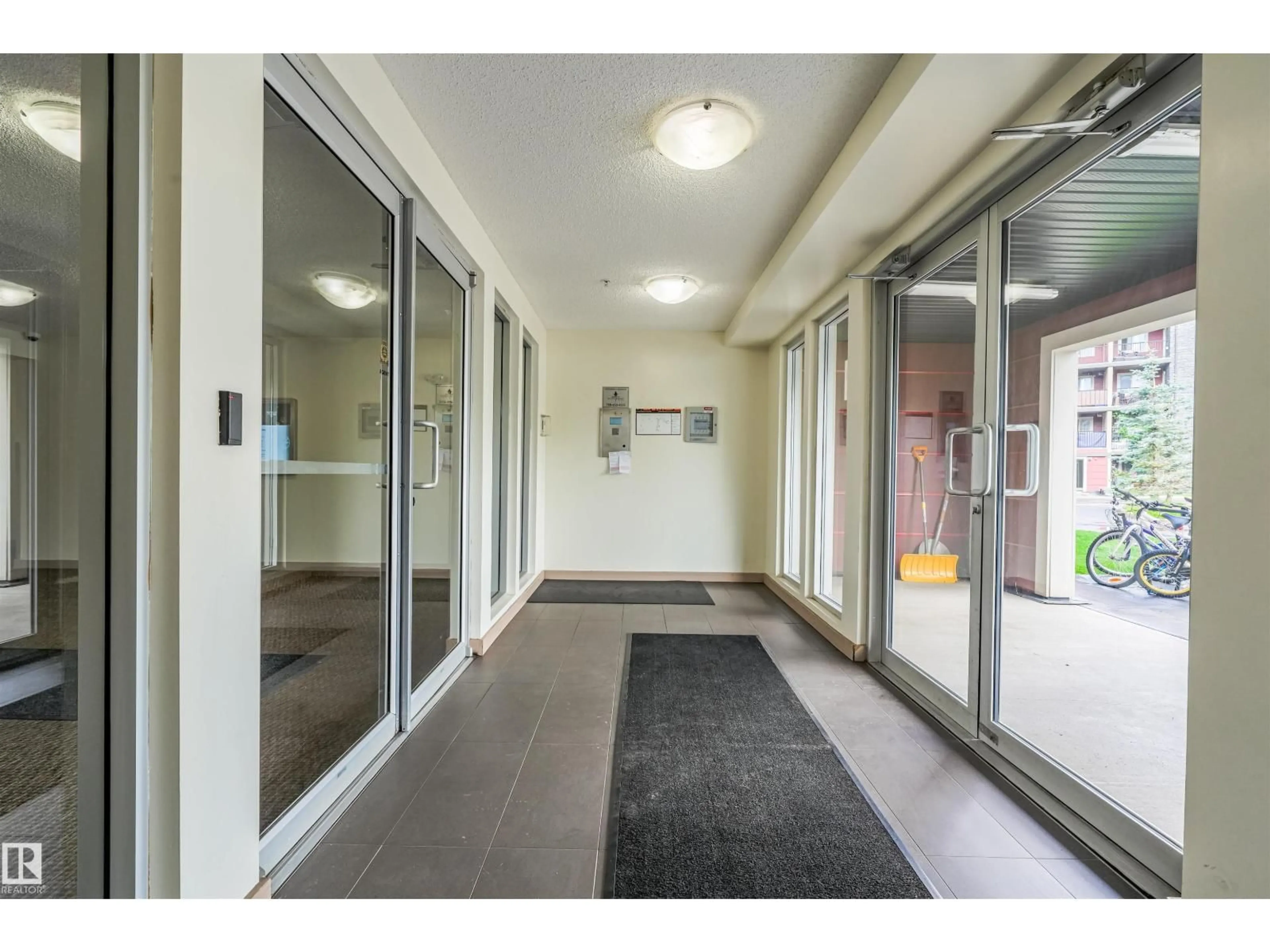 Indoor foyer for #124 - 3315 JAMES MOWATT TR, Edmonton Alberta T6W3L9