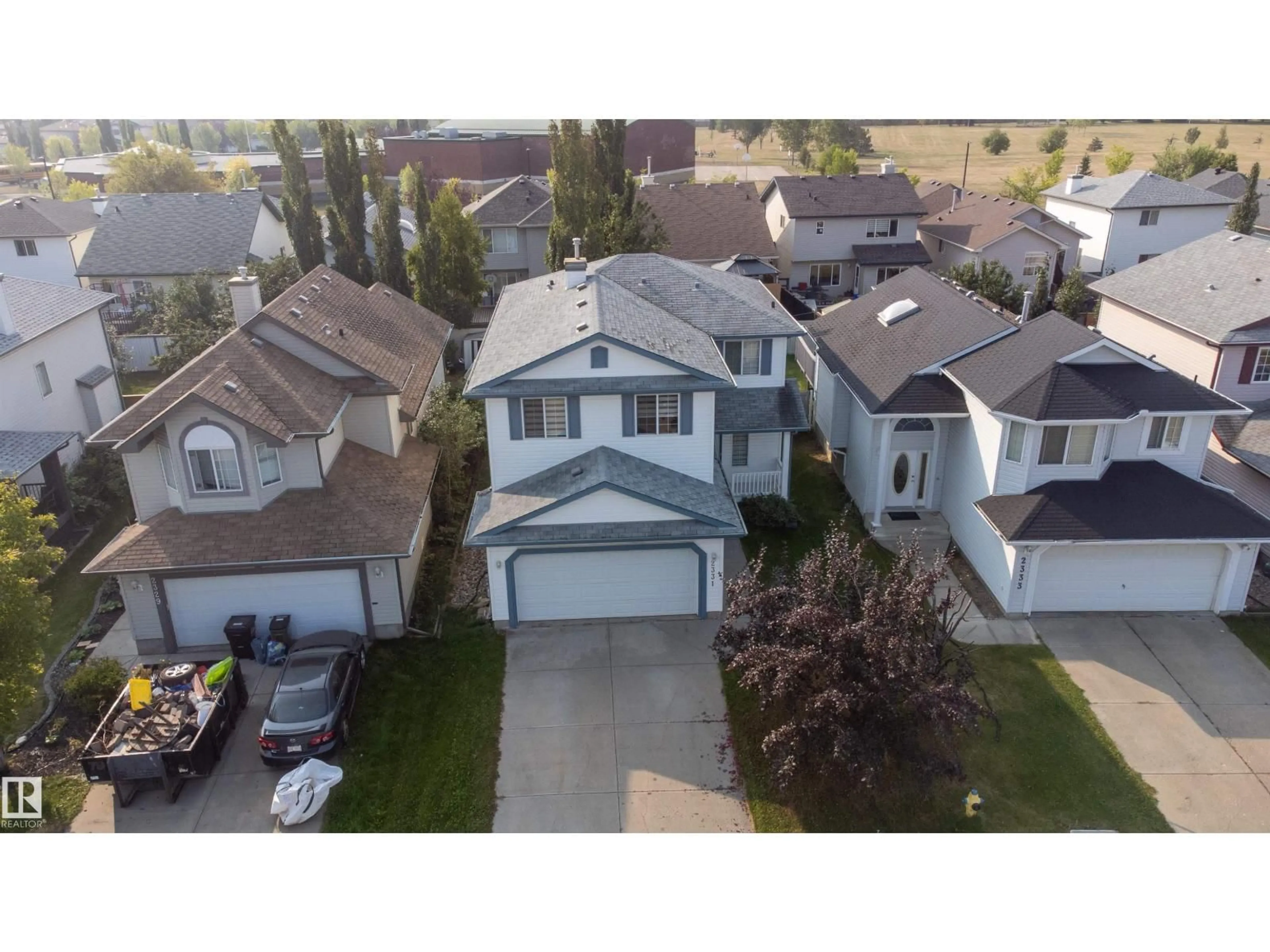 A pic from outside/outdoor area/front of a property/back of a property/a pic from drone, street for 2331 37B AV, Edmonton Alberta T6T1N9